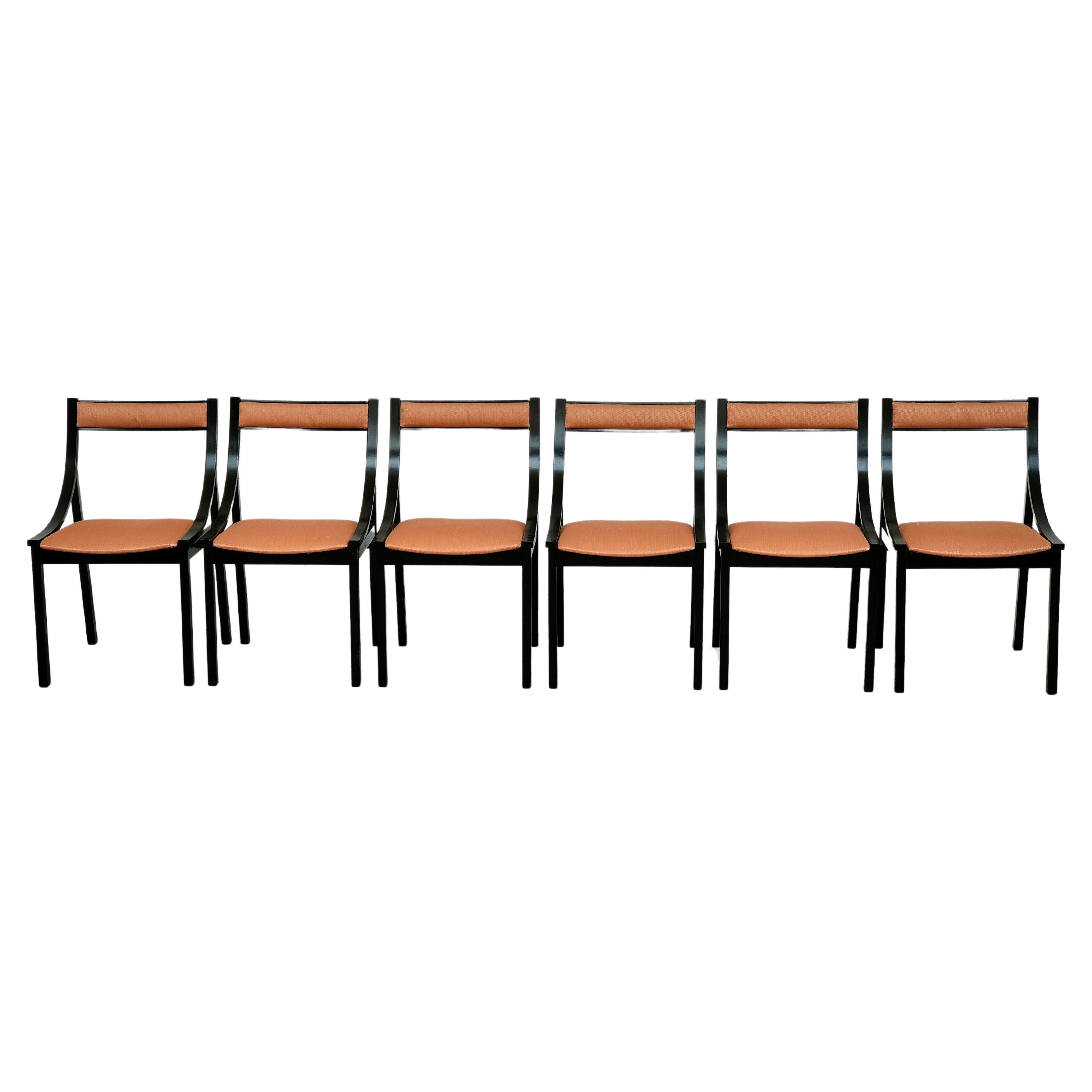 Set of 6 Sormani chairs designed by Carlo de Carli in ebonized wood and fabric seats. 
Classic Italian design from the 60s. 
Classic and light line, the chairs fit with class and elegance in both classic and modern contexts. 
They are timeless