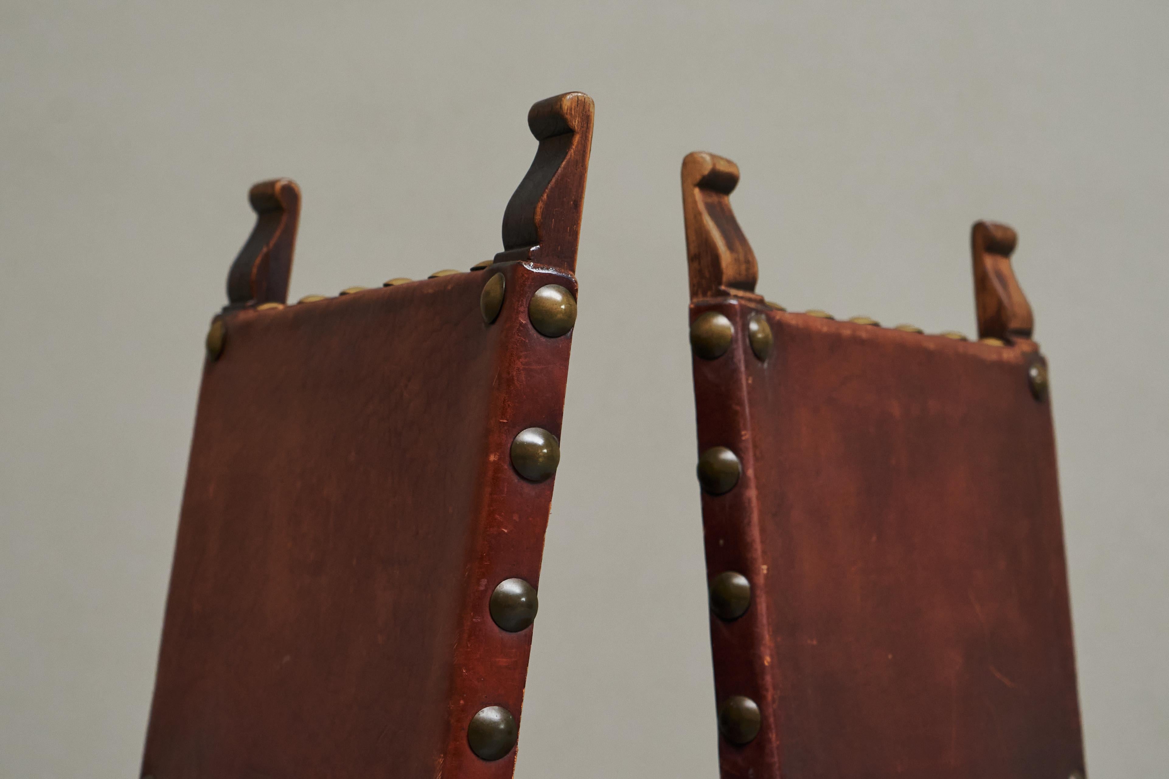 European Set of 6 'Spanish' Chairs in Solid Oak, Leather and Brass Europe 1960s For Sale