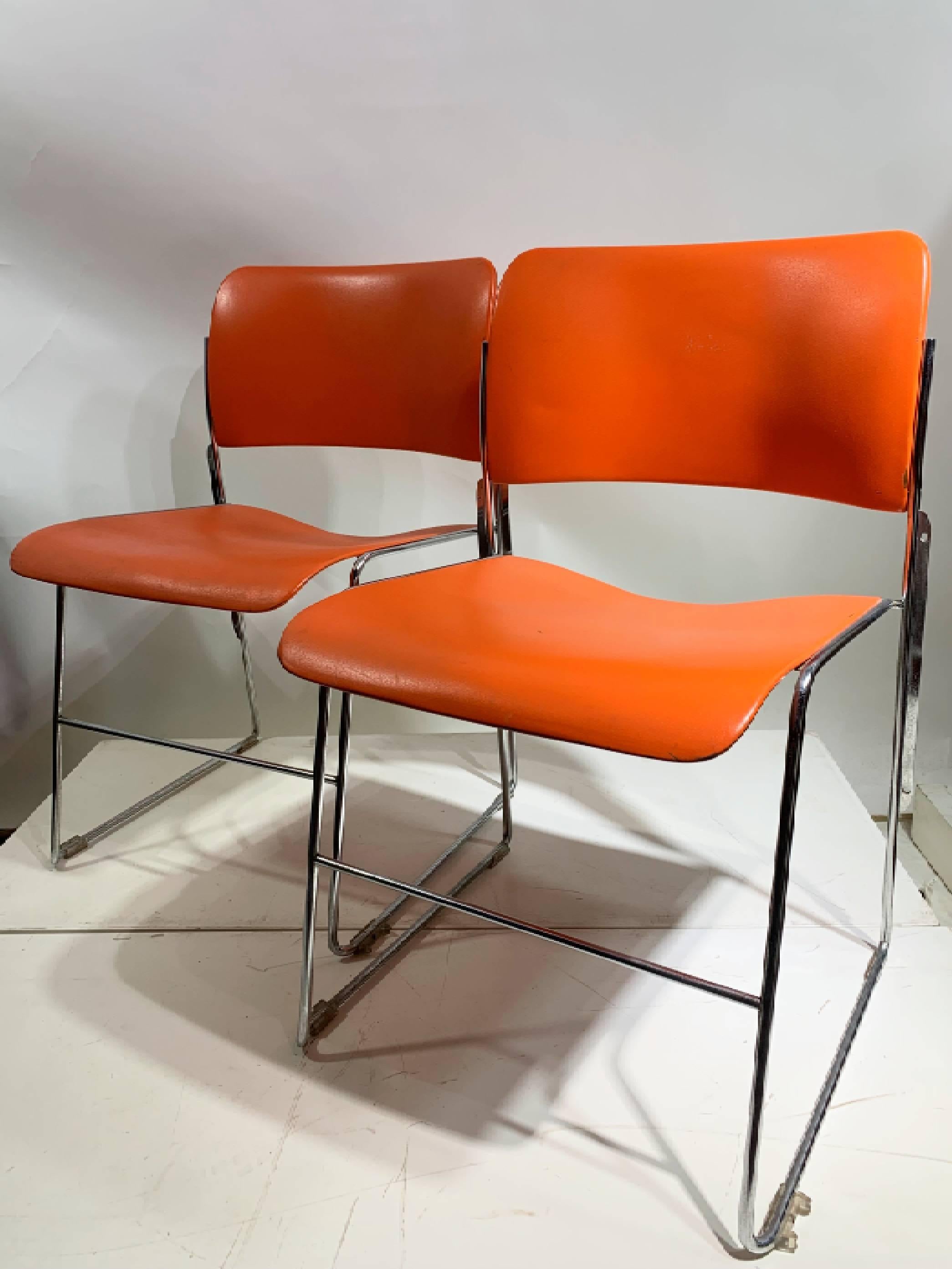 The 40/4 Chair, a timeless masterpiece designed by David Rowland and crafted by the renowned General Fireproofing Company. This iconic chair is celebrated for its exceptional design, which allows 40 chairs to be stacked within 4 feet of space,