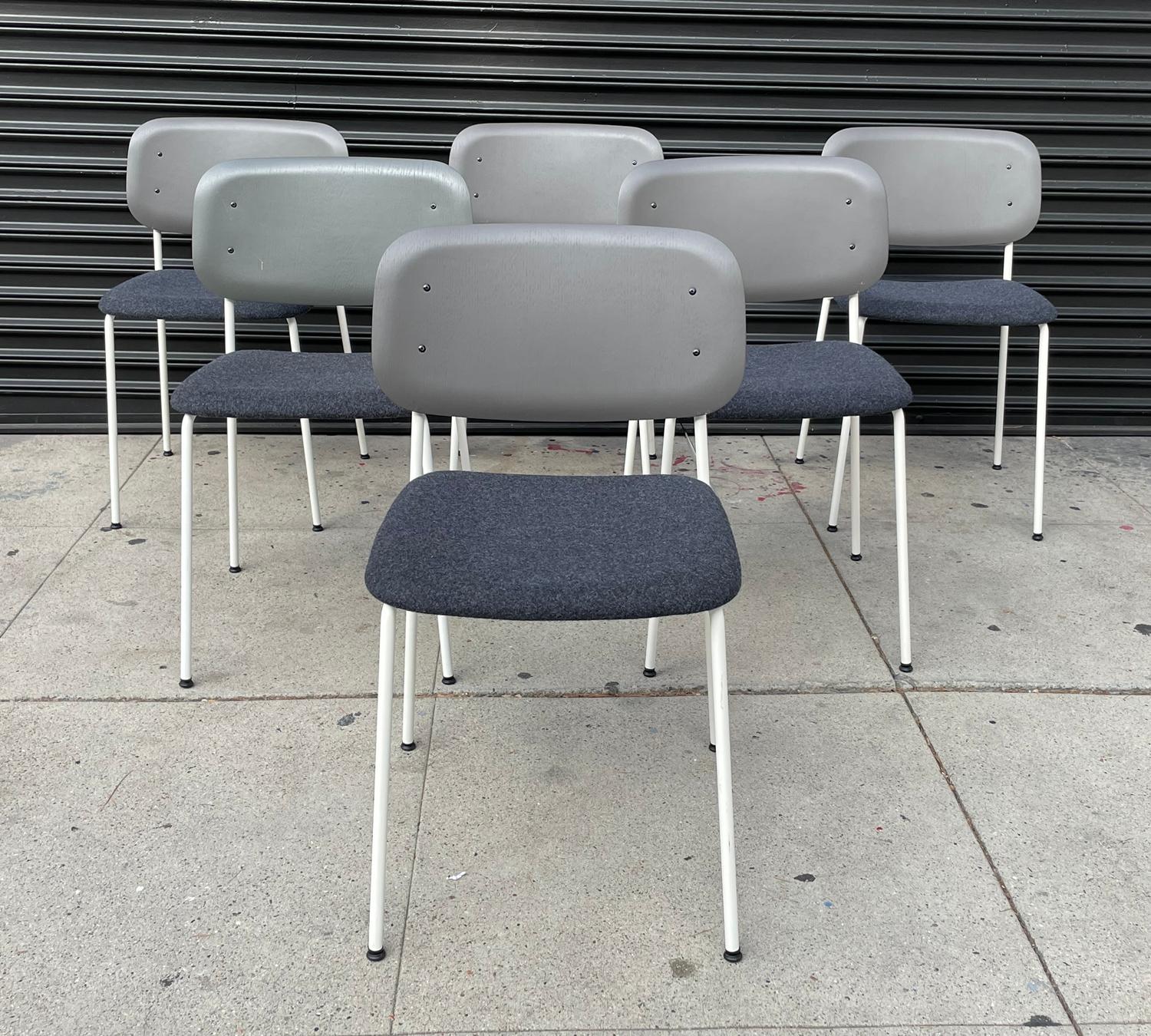 Beautiful set of 6 side or dining chairs designed by Iskos-Berlin for Hay furniture.
The chairs are stackable which are perfect for small spaces.

Molded plywood seat and back; tubular steel legs; fabric seat upholstery; plastic floor