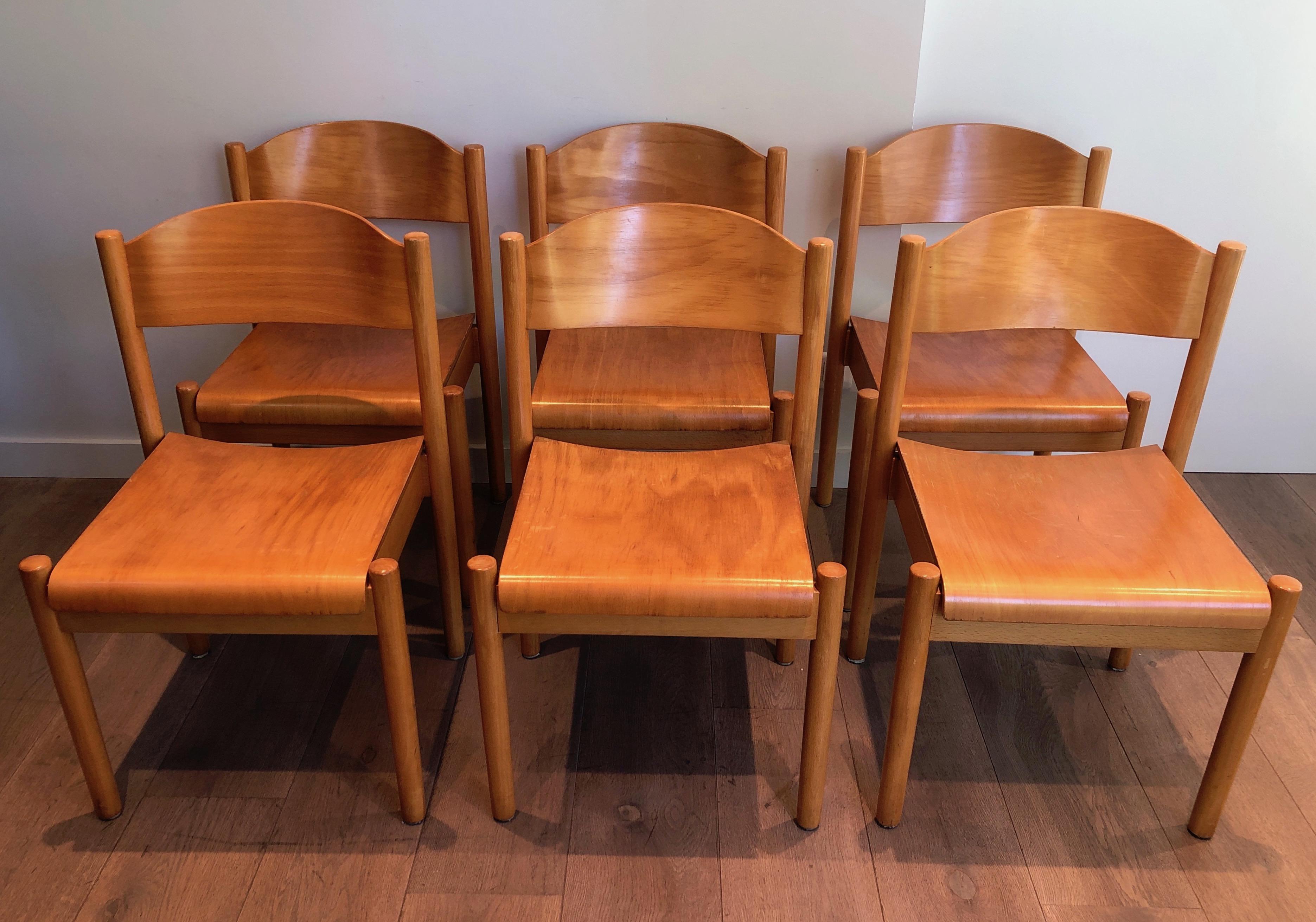 This set of 6 stackable chairs is made of pine. This is a nice work with curved seat and backpart which make these chairs comfortable with a great design. This is German work by Karl Klipper. There is a sticker with information concerning the