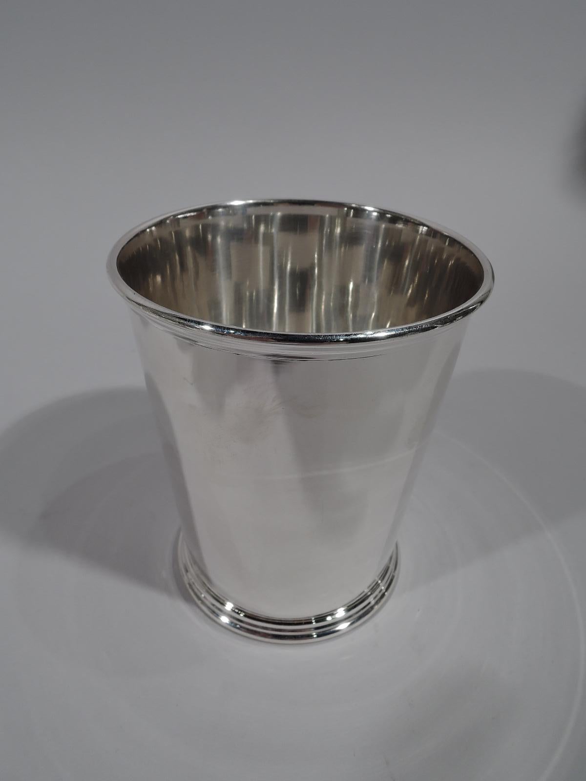 Set of 6 sterling silver mint julep cups. Made by S. Kirk & Son in Baltimore. Each: Straight and tapering sides, molded rim, and tapering sides. Fully marked including maker’s stamp (1932-61) and no. 277. Total weight: 24 troy ounces.