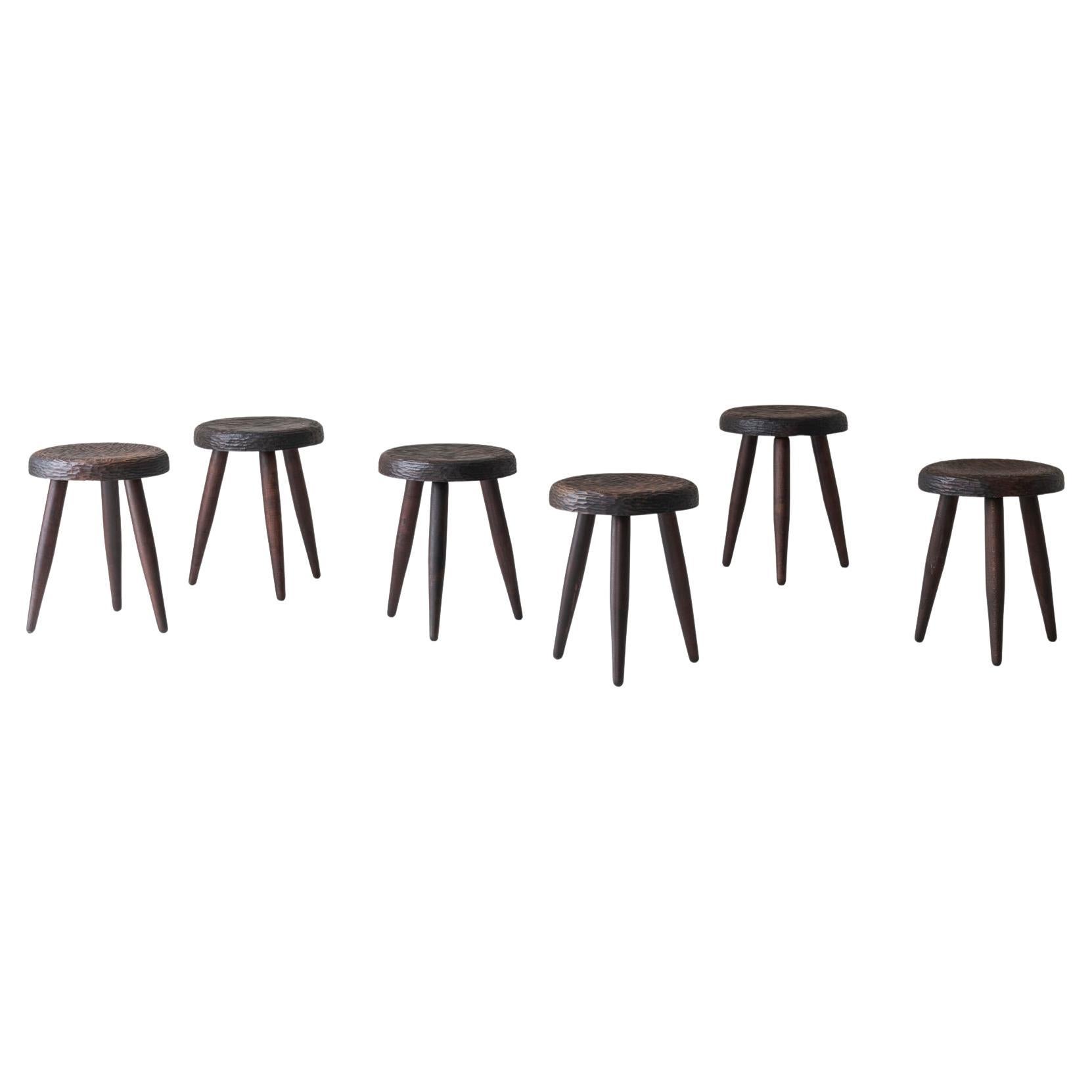 Set of 6 stools in the manner of Charlotte Perriand, France 1960s.
