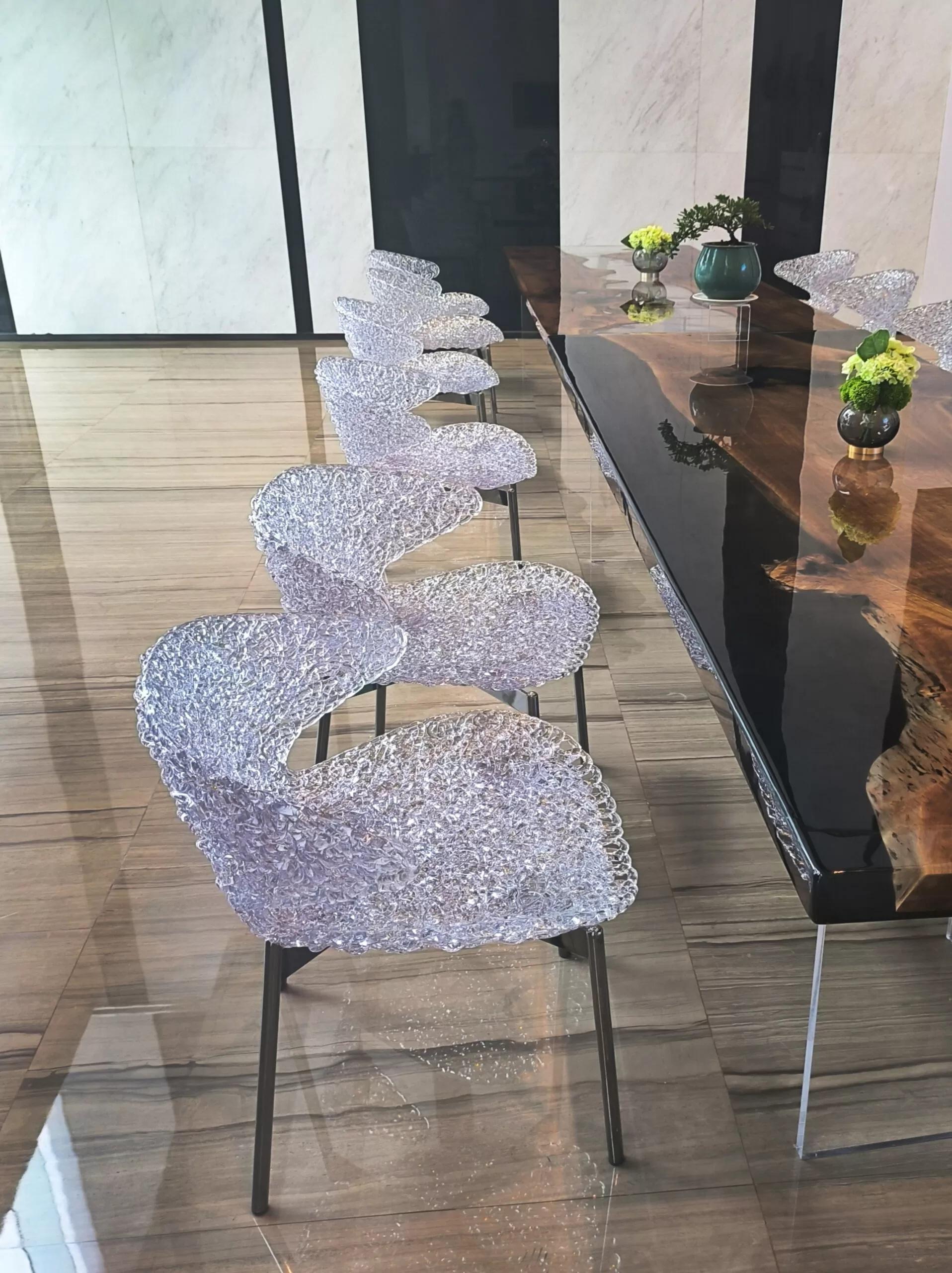 The Swan Chair Set of 6 brings iconic design, comfort, and modern sophistication to your home or workspace. Each chair features a gracefully curved silhouette that creates a unique aesthetic, while the energizing light reflections from the sleek