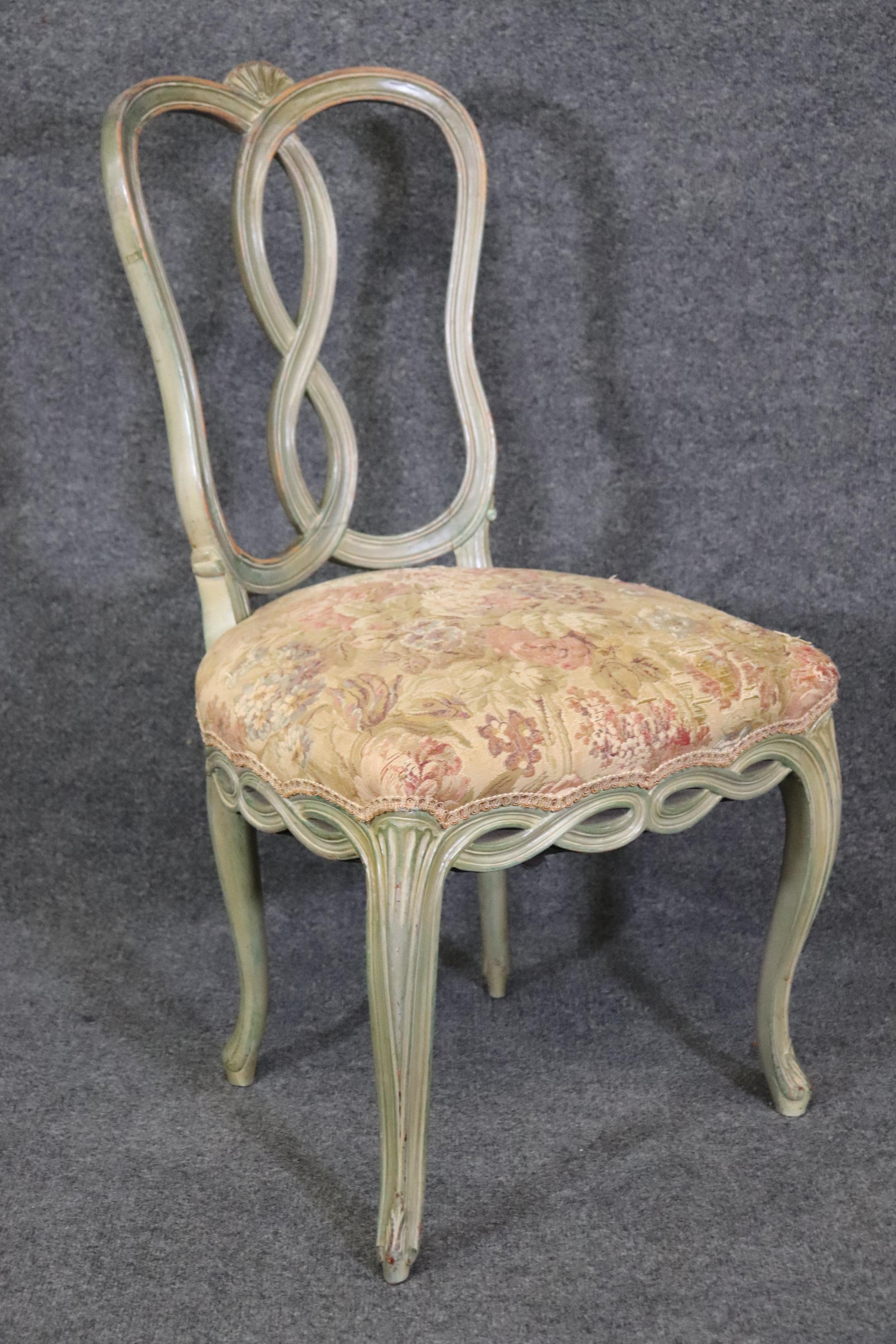 Dimensions- H: 36 1/4in W: 19 3/4in D: 22in SH: 19 3/4in 
This Set of 6 Swedish NeoClassical Paint Decorated Dining Chairs are an exceptional example of early 20th century decorative Swedish/Neoclassical furniture. This set is made of the highest