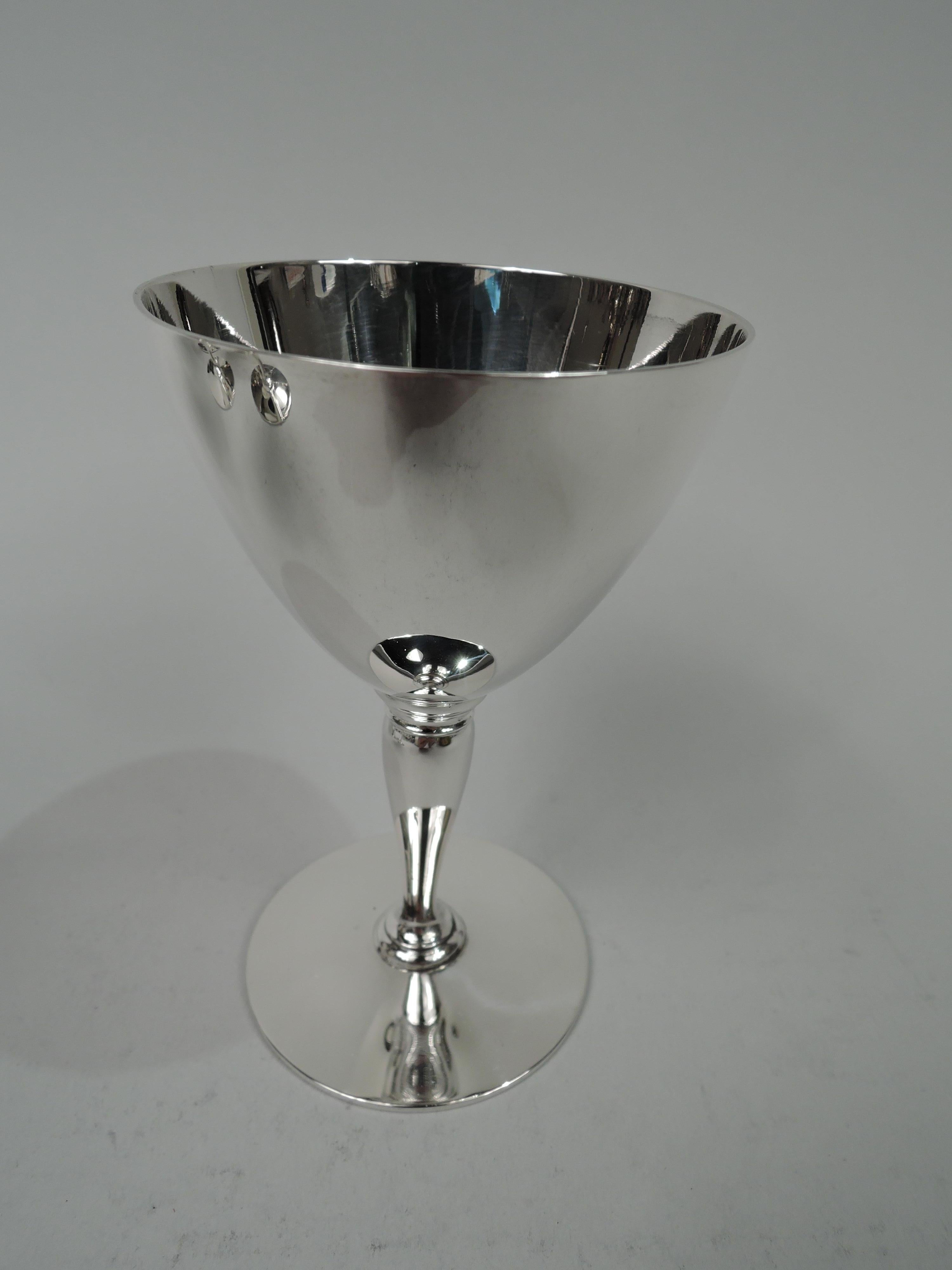 Set of 6 Art Deco sterling silver cocktail cups. Made by Tiffany & Co. in New York, ca 1915. Each: Cone on baluster mounted to circle. Spare and functional. Nice balance for swishing the booze around. Fully marked including maker’s stamp, pattern