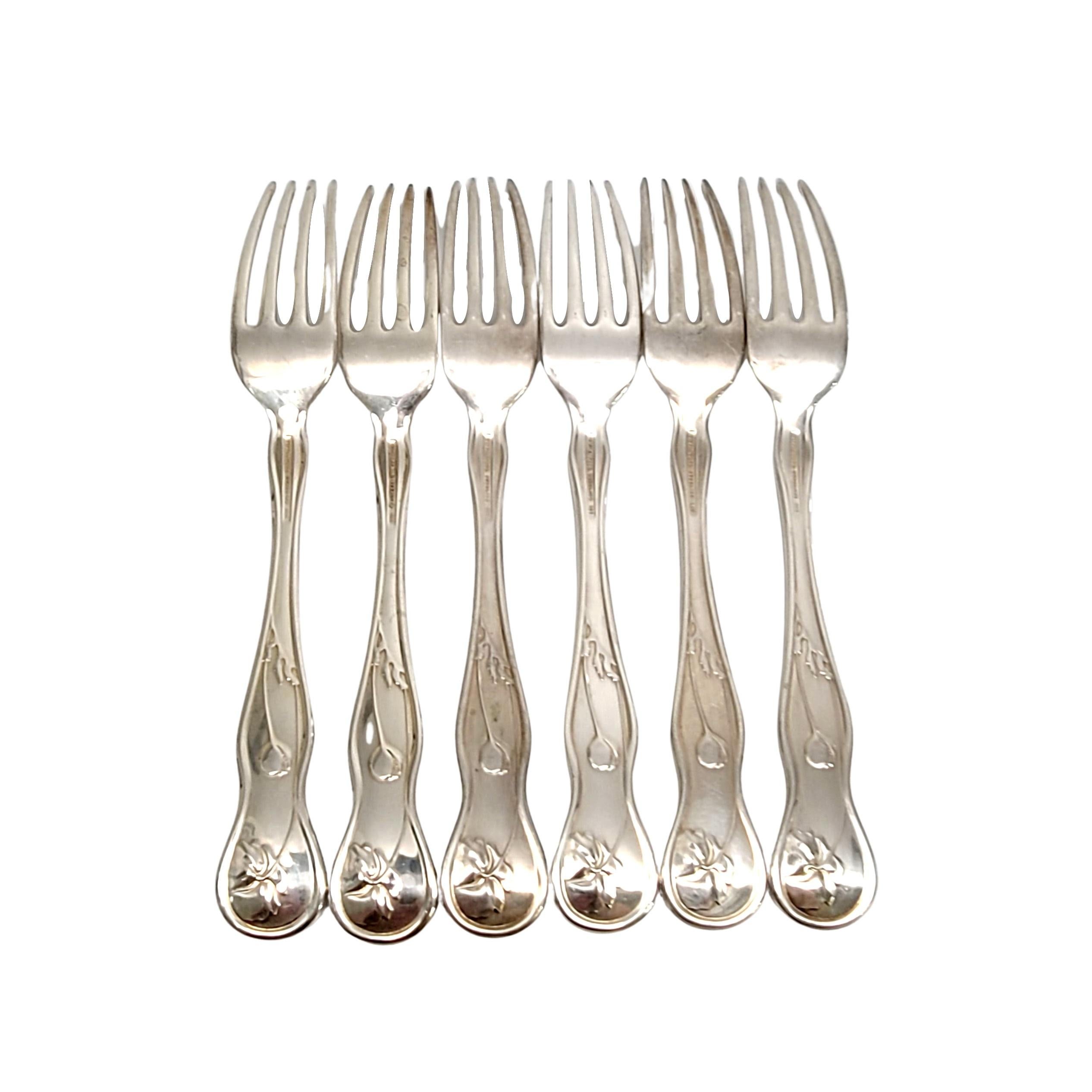 Set of 6 sterling silver dinner forks by Tiffany & Co in the American Garden pattern.

No monogram

American Garden is a multi-motif pattern inspired by the extensive botanical beauty of the United States. Does not include Tiffany box or