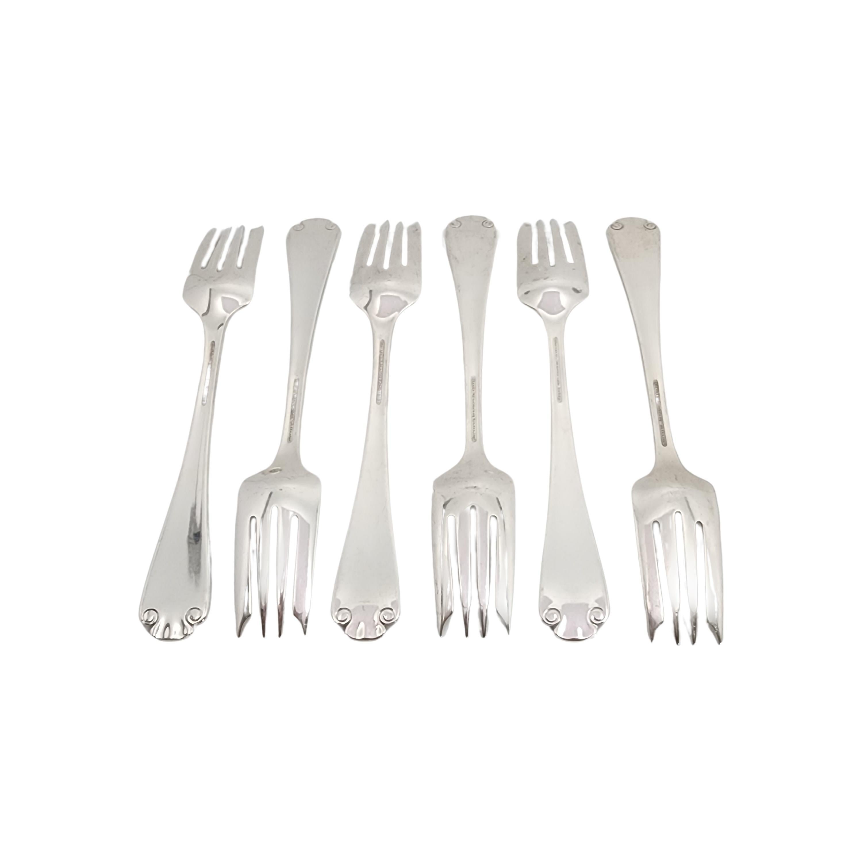 Set of 6 sterling silver salad forks by Tiffany & Co in the Flemish pattern.

No monogram.

The Flemish pattern features a simple and elegant scroll design, making it a timeless classic that is still in demand today. Hallmarks date these pieces to
