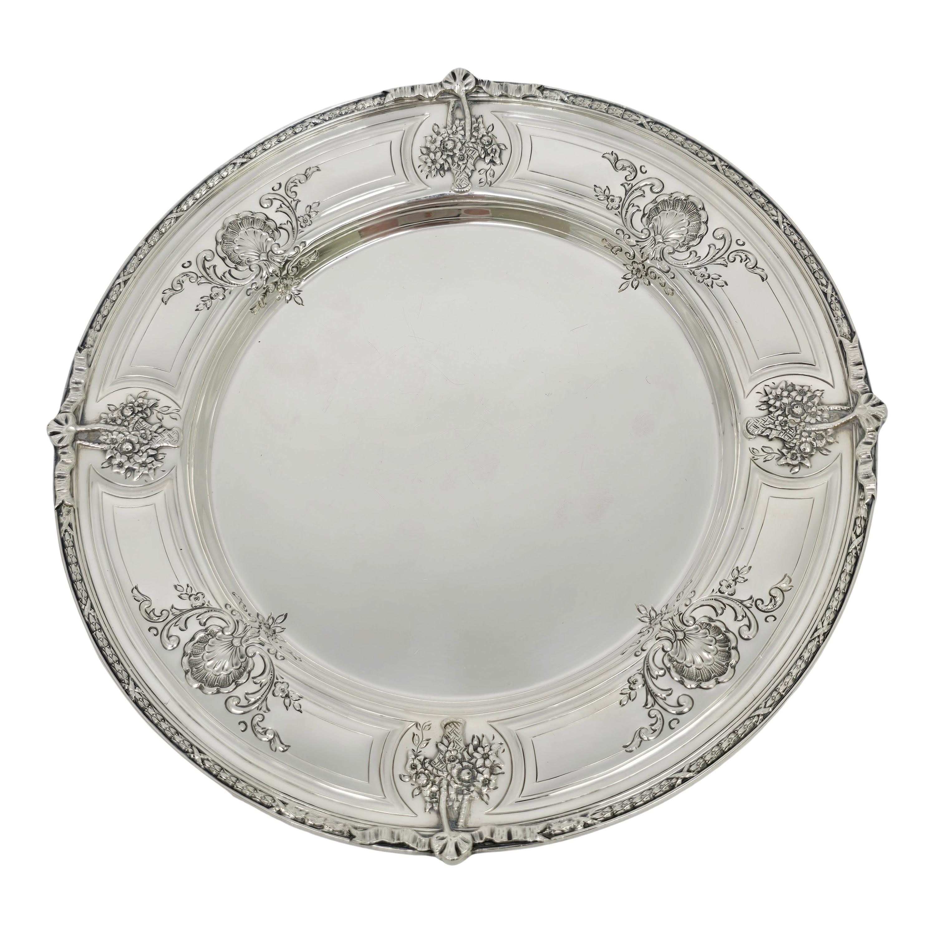 Set of 6 sterling silver salad plates by Tiffany & Co.

No monogram

Beautifully ornate salad plates, rims feature baskets overflowing with flowers alternating with a scalloped flower design around the rim. Does not include Tiffany box or