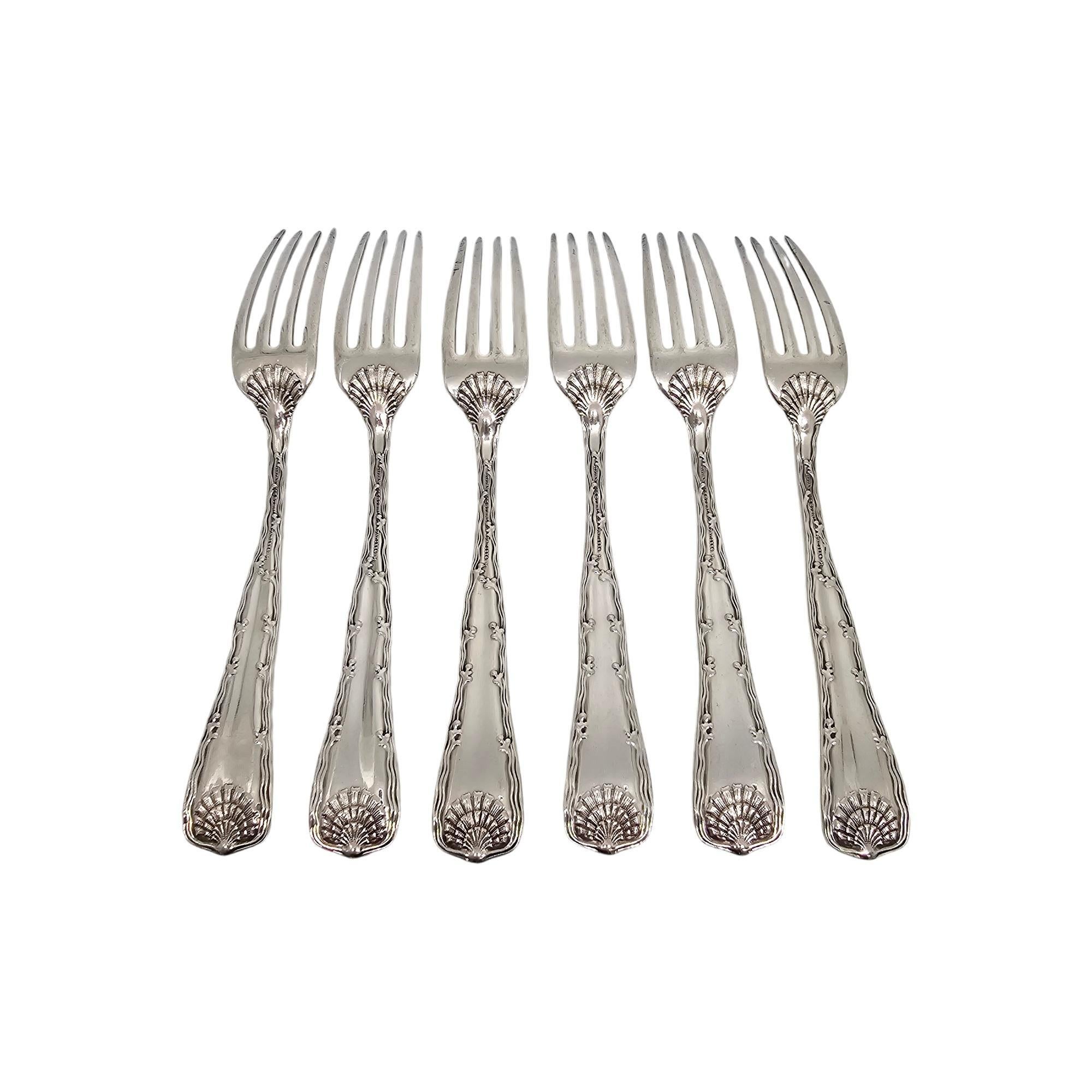 Set of 6 sterling silver forks by Tiffany & Co in the Wave Edge pattern with monogram.

Monogram appears to be F.

The Wave Edge pattern is a marine motif designed by Charles T. Grosjean. Hallmarks date this piece to manufacture under the