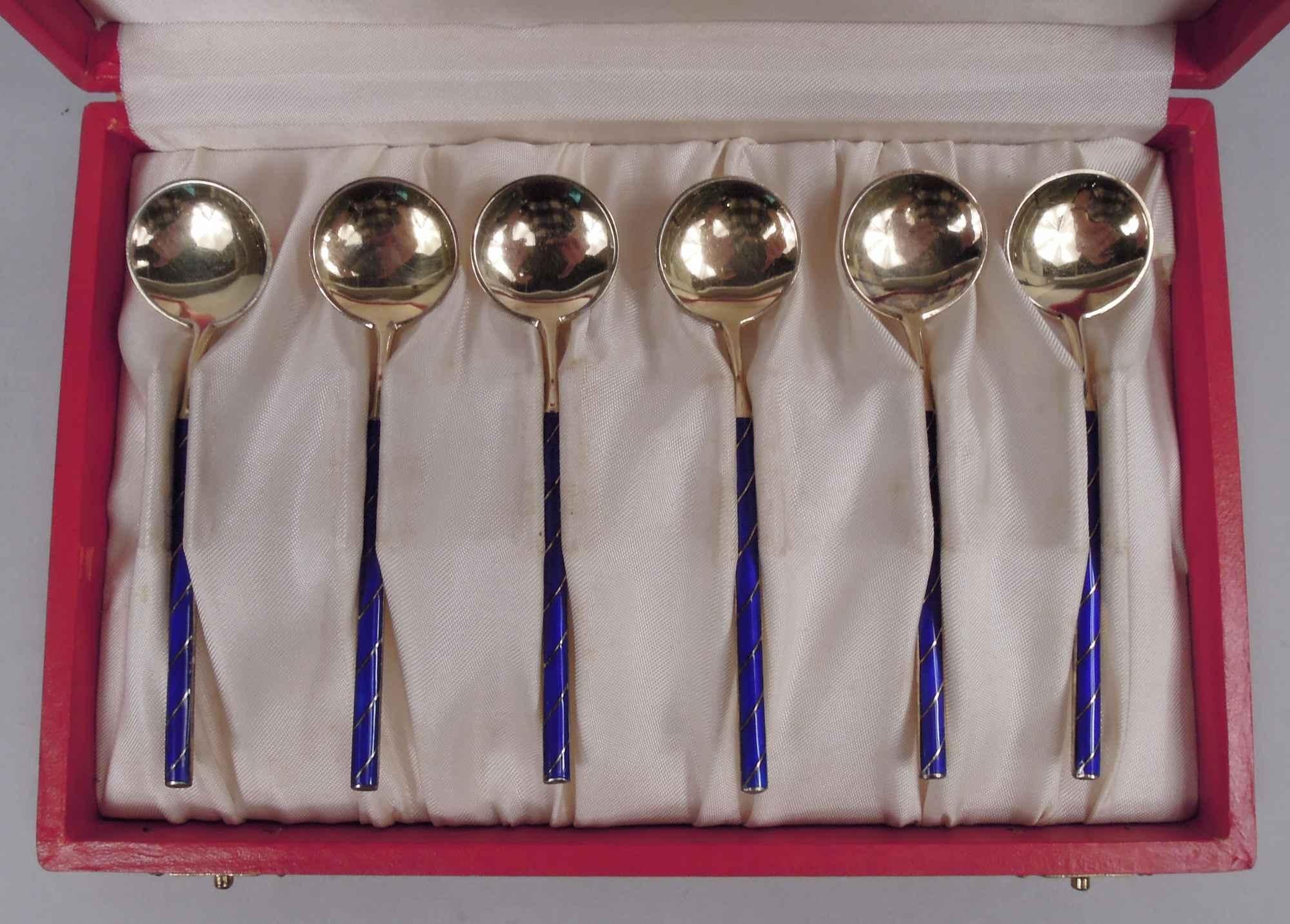 Set of 6 Midcentury Modern sterling silver demitasse spoons. Made by Tostrup in Norway. Each: Straight and narrow stem with round and shallow bowl. Double-sided gilding. Cobalt enamel on stem front in diagonal frames. In original red case with
