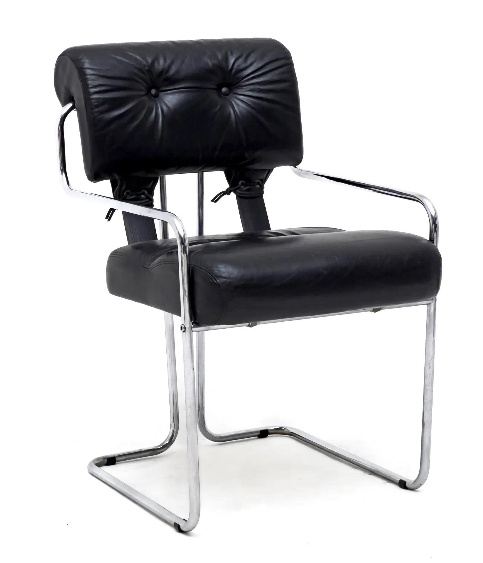 Handsome set of 6 Tucroma chairs designed by Guido Faleschini for Mariani, Pace. Sleek, original leather in black with the iconic chrome tube frames. Eyelets with leather strap closures secure the cushions to each other and to the frame. Beautiful