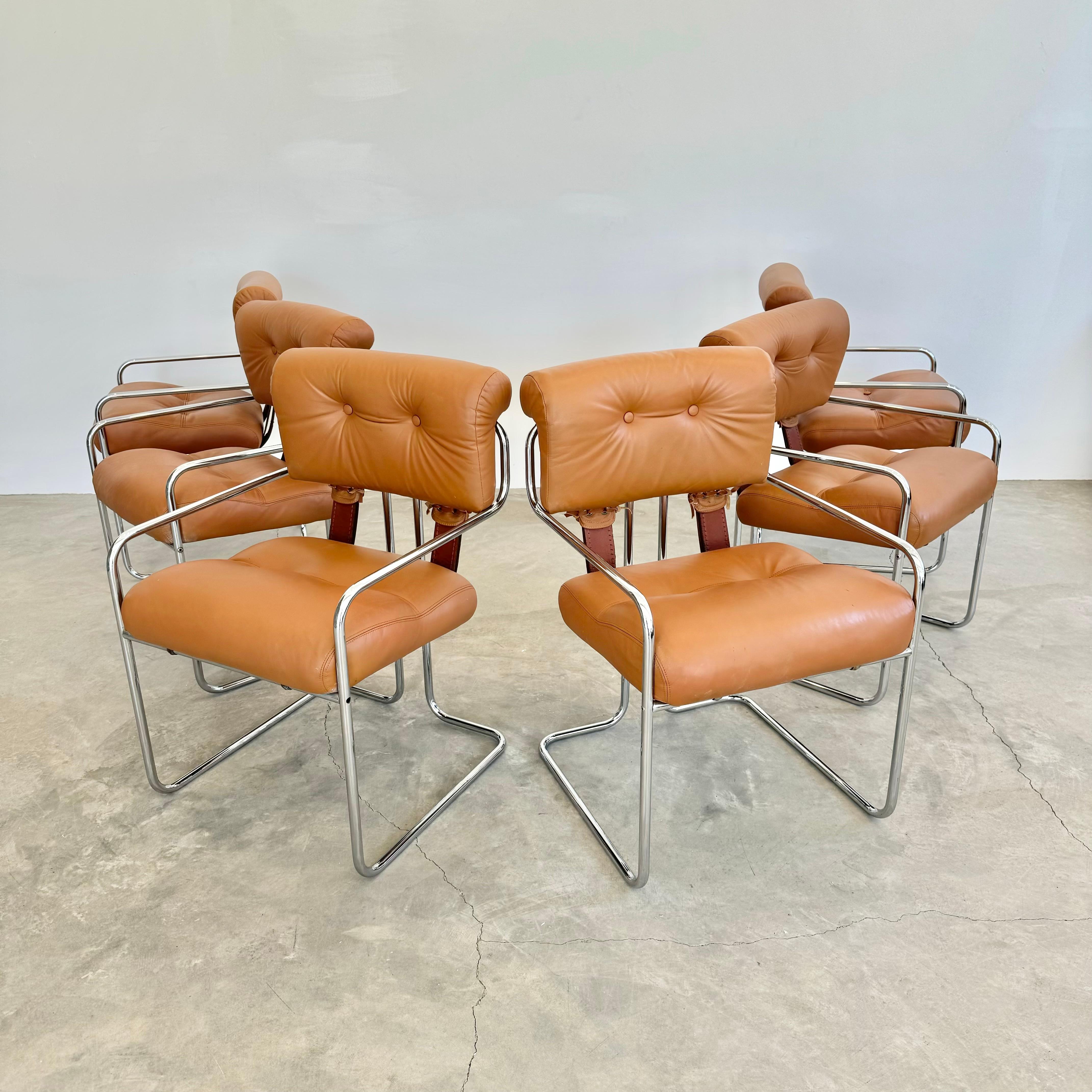 Stunning set of 6 Tucroma chairs by Guido Faleschini for Mariani, Pace. Beautiful, original, tan leather seats and seat backs along with classic chrome tube frame. A staple of beautiful modern Italian design, these chairs will transform any room or