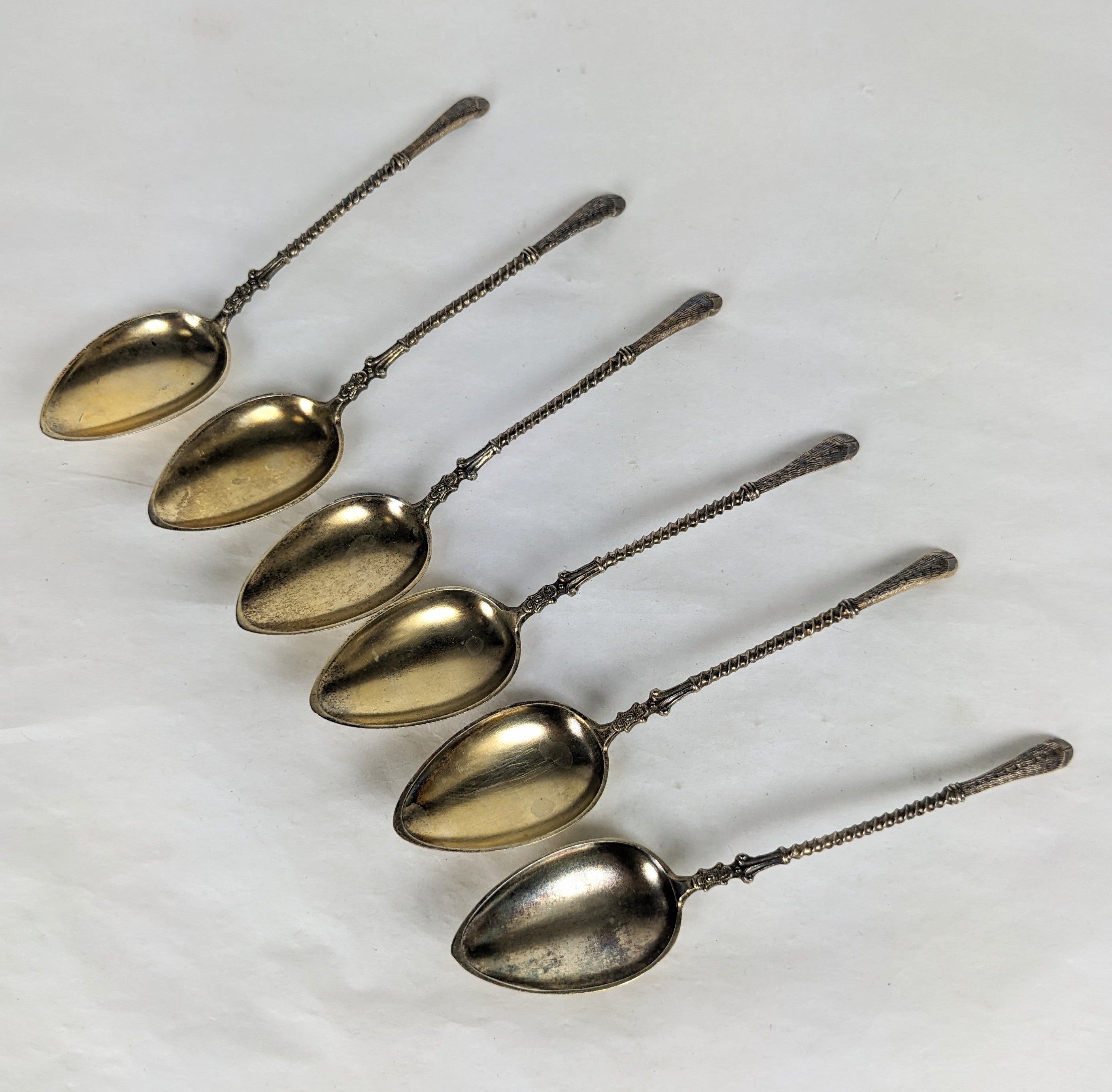 Set of 6 Unusual Figural Demitasse Spoons from the turn of the 20th Century with animal hoof handles. Beautifully detailed with twisted stem and vermeil bowls. 1900 Germany. 