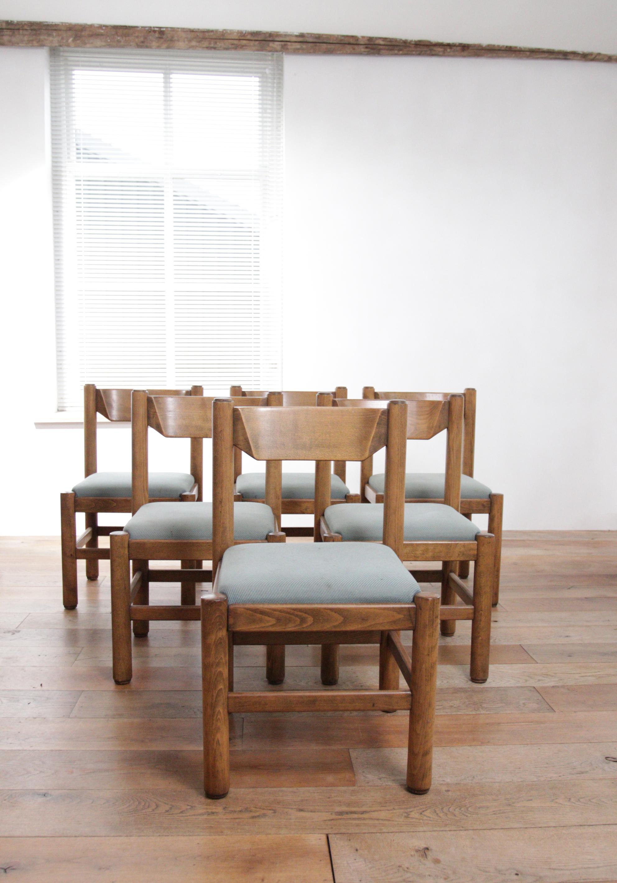 Beautiful design dining room chairs dating from the ‘70s.
These chairs are often attributed to Vico Magistretti, produced by Cassina, made in Italy. 
Made of solid beech wood. 

The seats must be reupholstered, we can arrange this in