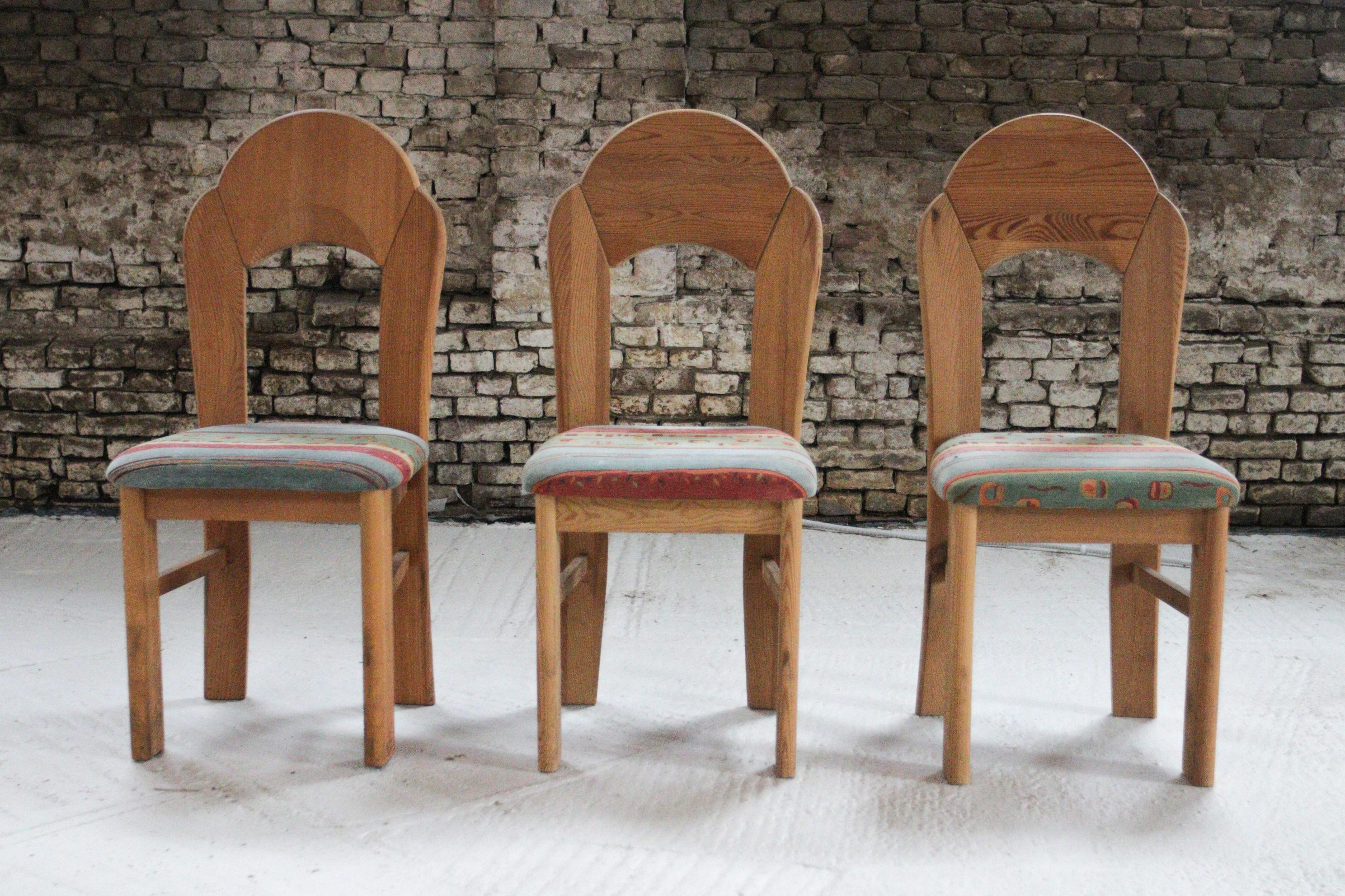Embrace the vivacious spirit of the '80s with this striking set of chairs. Crafted with solid pine, each chair stands as a robust testament to the era's bold experimentation with form and material.

The chairs' design features a distinctive high