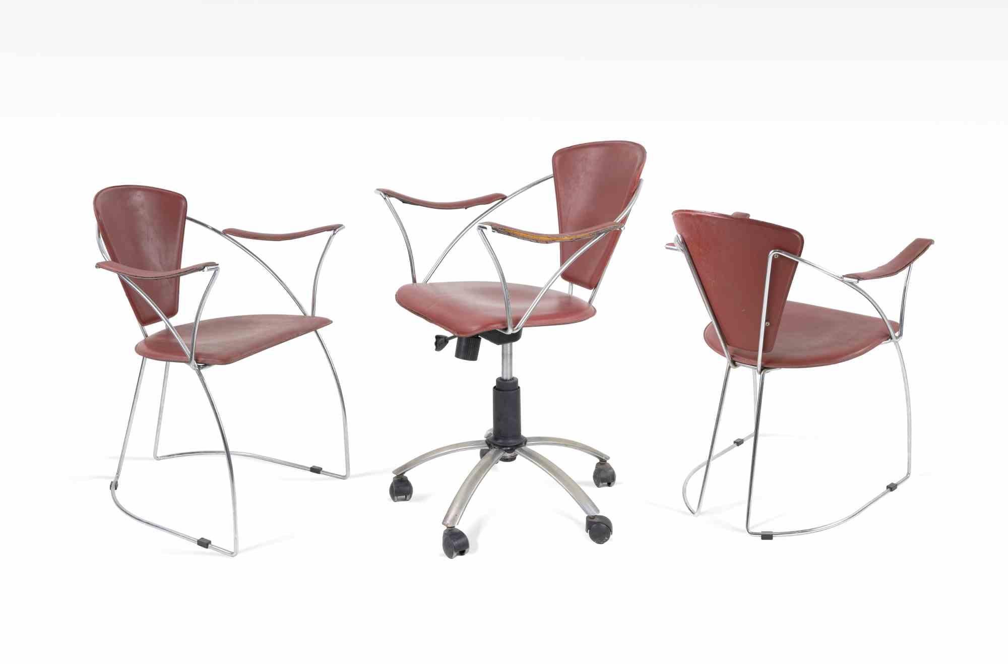 Set di 6 sedie vintage Arrben realizzate in Italia negli anni '80.

Metallo cromato e pelle.

Tutte le sedie hanno i braccioli.

Una delle sedie ha le ruote.

Alcune sedie sono in condizioni discrete, vedi immagini allegate.