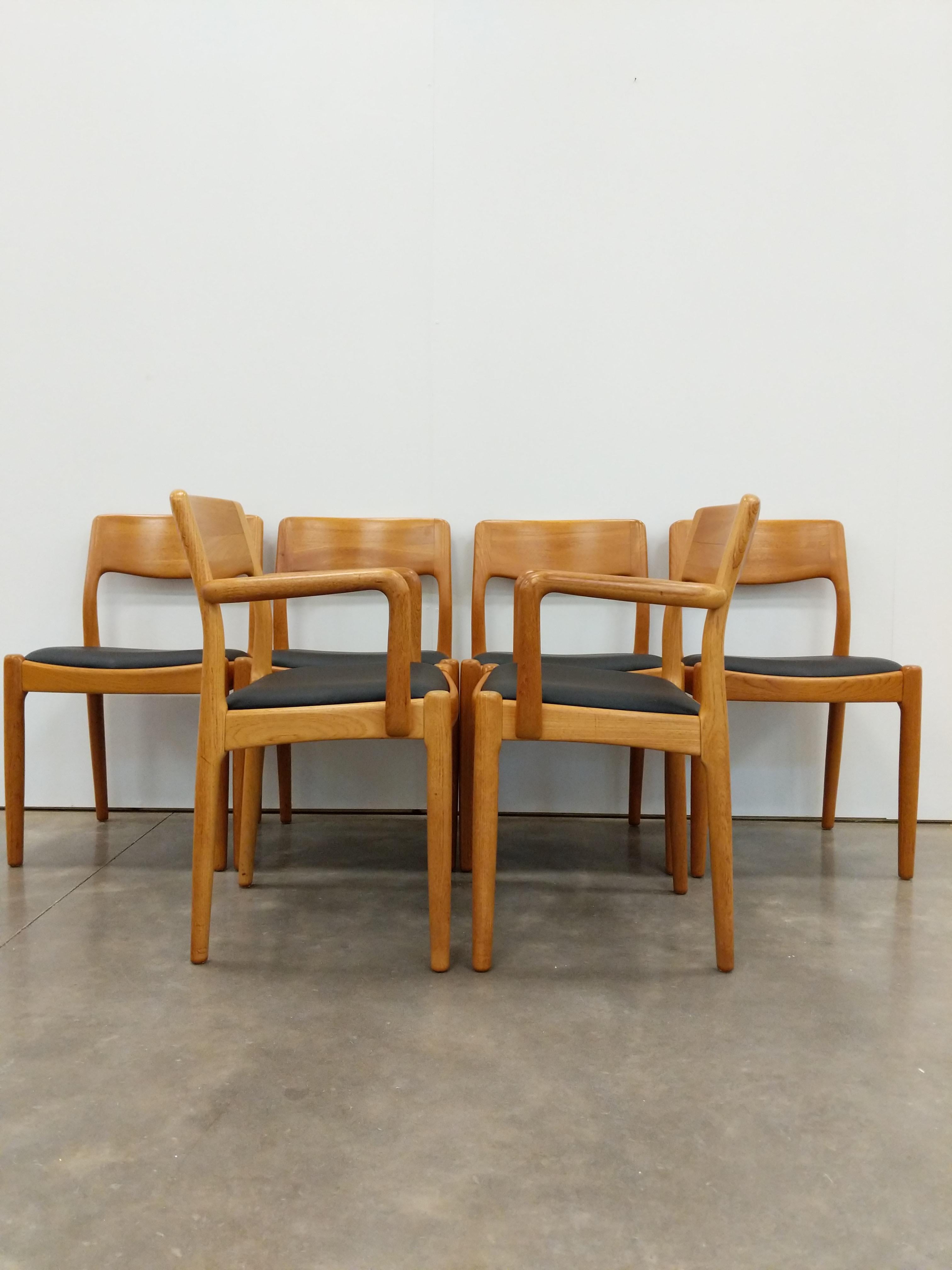 Set of 6 authentic vintage mid century Danish / Scandinavian Modern teak dining chairs.

Designed by Juul Kristensen for JK Denmark.

Maker's stamp on bottom (see photo).

This set is in excellent refurbished condition with few signs of age-related