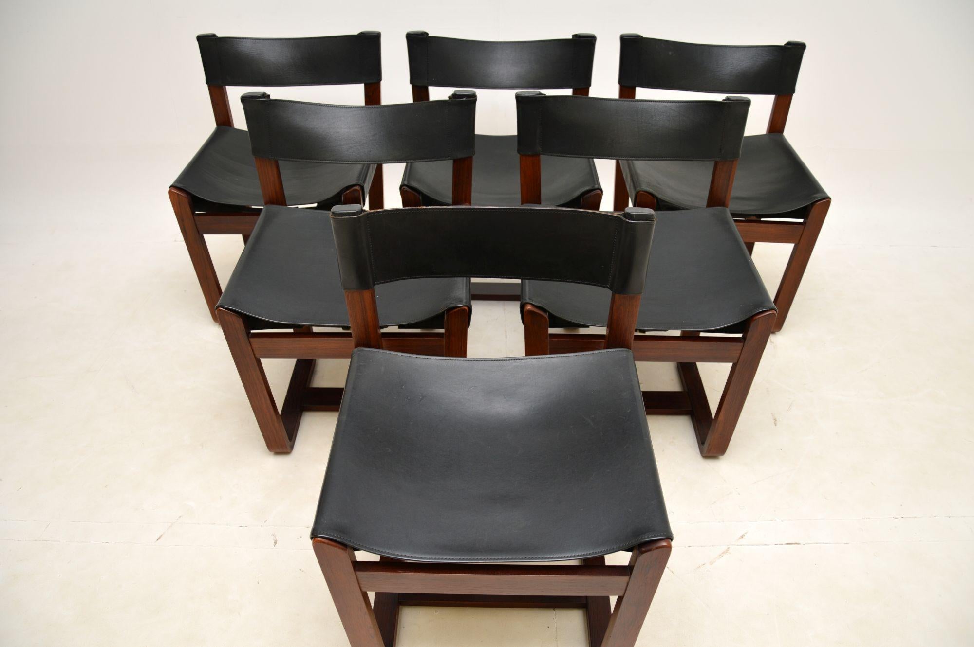 A stylish and very well made set of six dining chairs. They were designed by Gunther Hoffstead and were made in England by Unilfex in the 1960s.

They have an unusual and striking design, with beautiful frames and strapped thick leather
