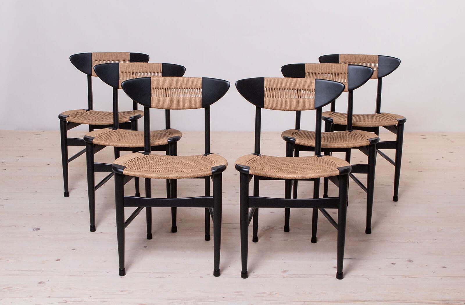 This set of six vintage dining chairs was made around 1960s, most probably in Italy. The whole set was carefully restored, all wooden elements have been cleaned and refinished with black polyurethane paint. Rope seatings and backrests have been