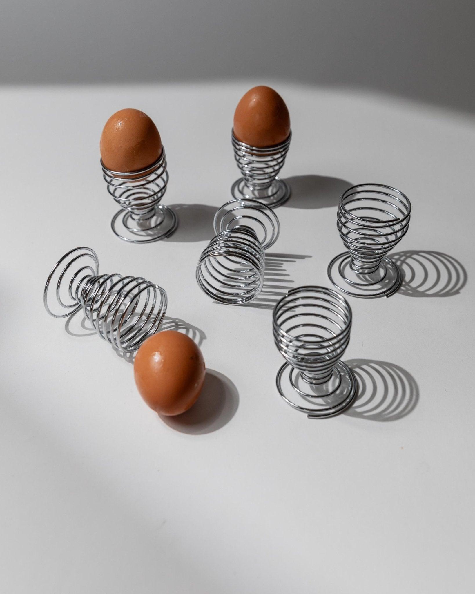 Set of 6 Vintage Egg Cups - Spiral made of Chrome Metal Timeless Space Age Design Italy 1970s - Gift Idea Retro, Elegant Table Decoration

This stylish set of 6 vintage egg cups from 1970s Italy embodies the playful elegance of the Space Age era.