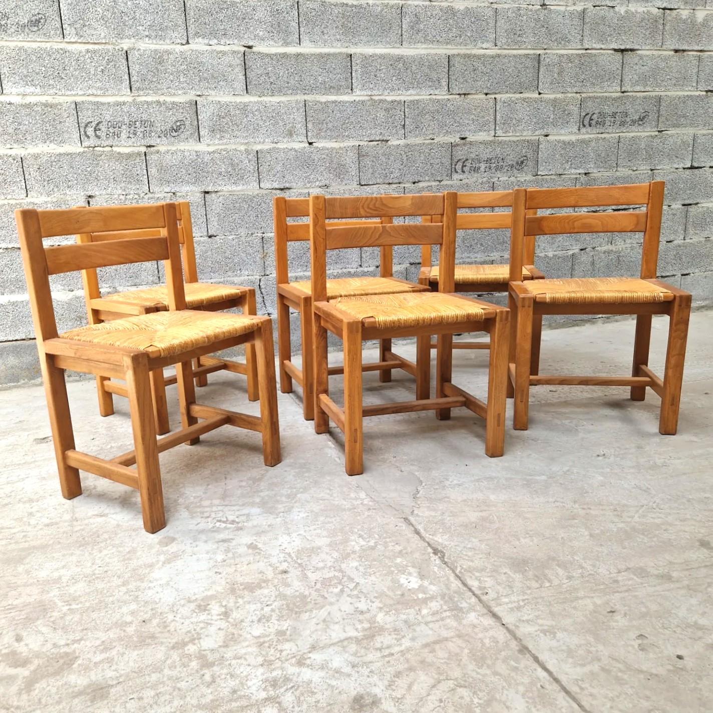 Set of 6 vintage french solid elm and raw dining chairs, Maison Regain.
Good condition.
Stamped.