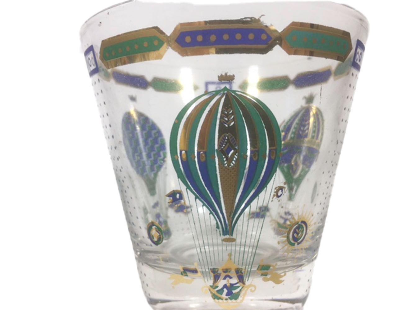 Six Georges Briard old fashion glasses in the fancy free pattern, having three different hot air balloons in Blue and green enamel with 22k gold accents.