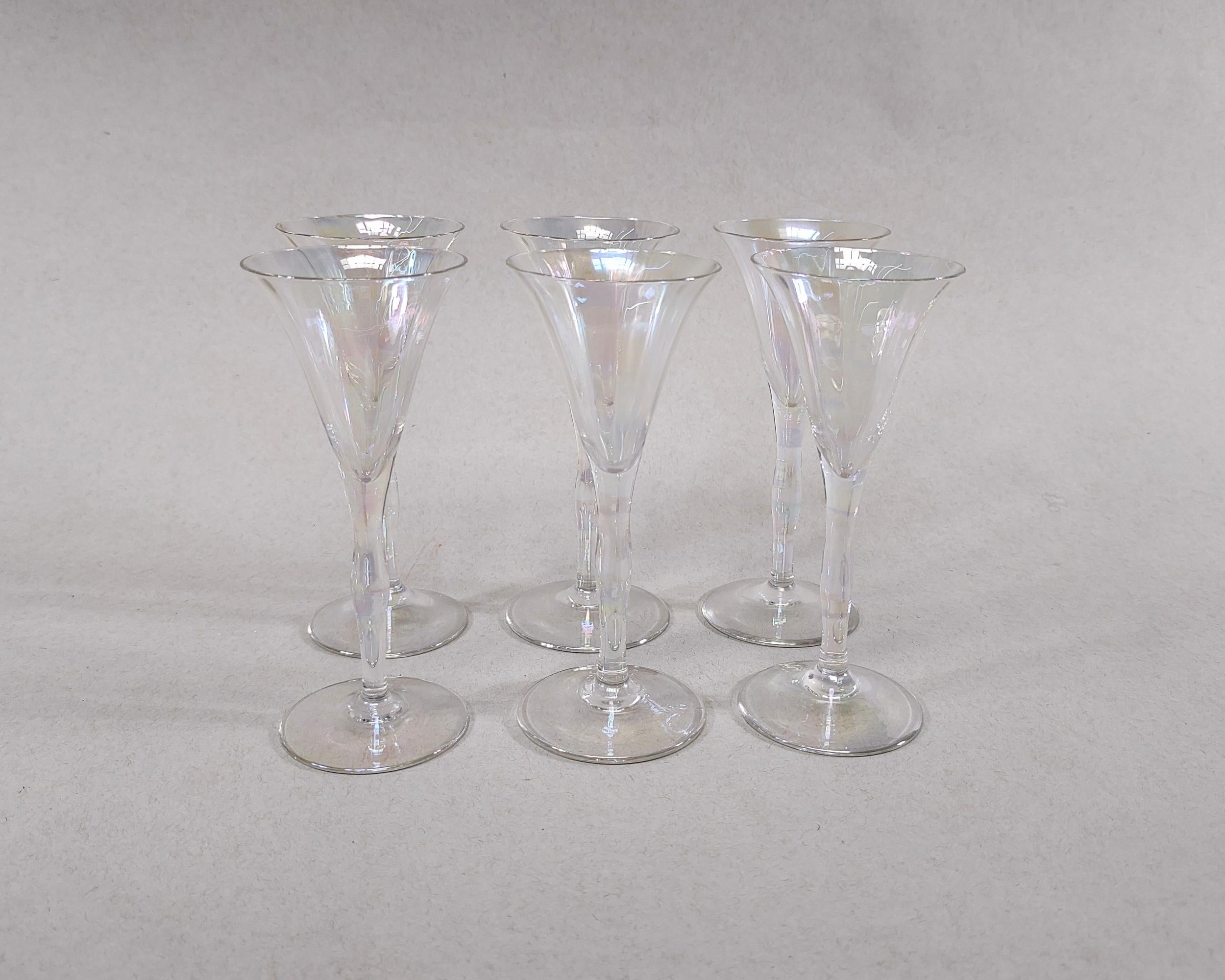 Set of six vintage 'Mother of Pearl' delicate iridescent flared horn-shaped aperitif cordial glasses by Fostoria circa 1930. Flared thin rims and hourglass shaped stems. Hand blown glass. Overall excellent condition, no chips or cracks.

5.5