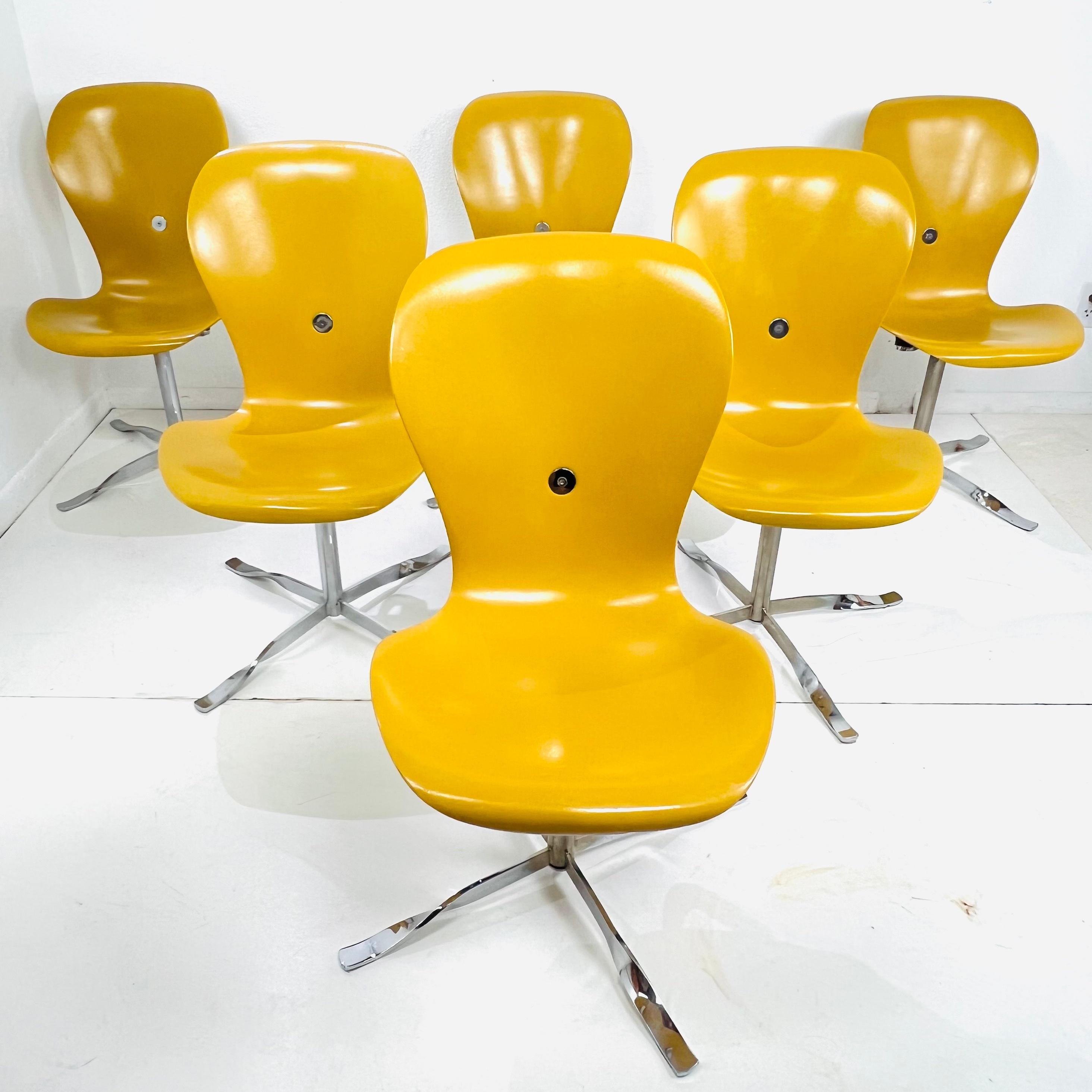 Set of 6 Ion dining chairs, designed by Gideon Kramer and produced by American Desk Corporation. These original and iconic pieces were first designed for the revolving restaurant at the top of the Seattle Space Needle. They were introduced for the