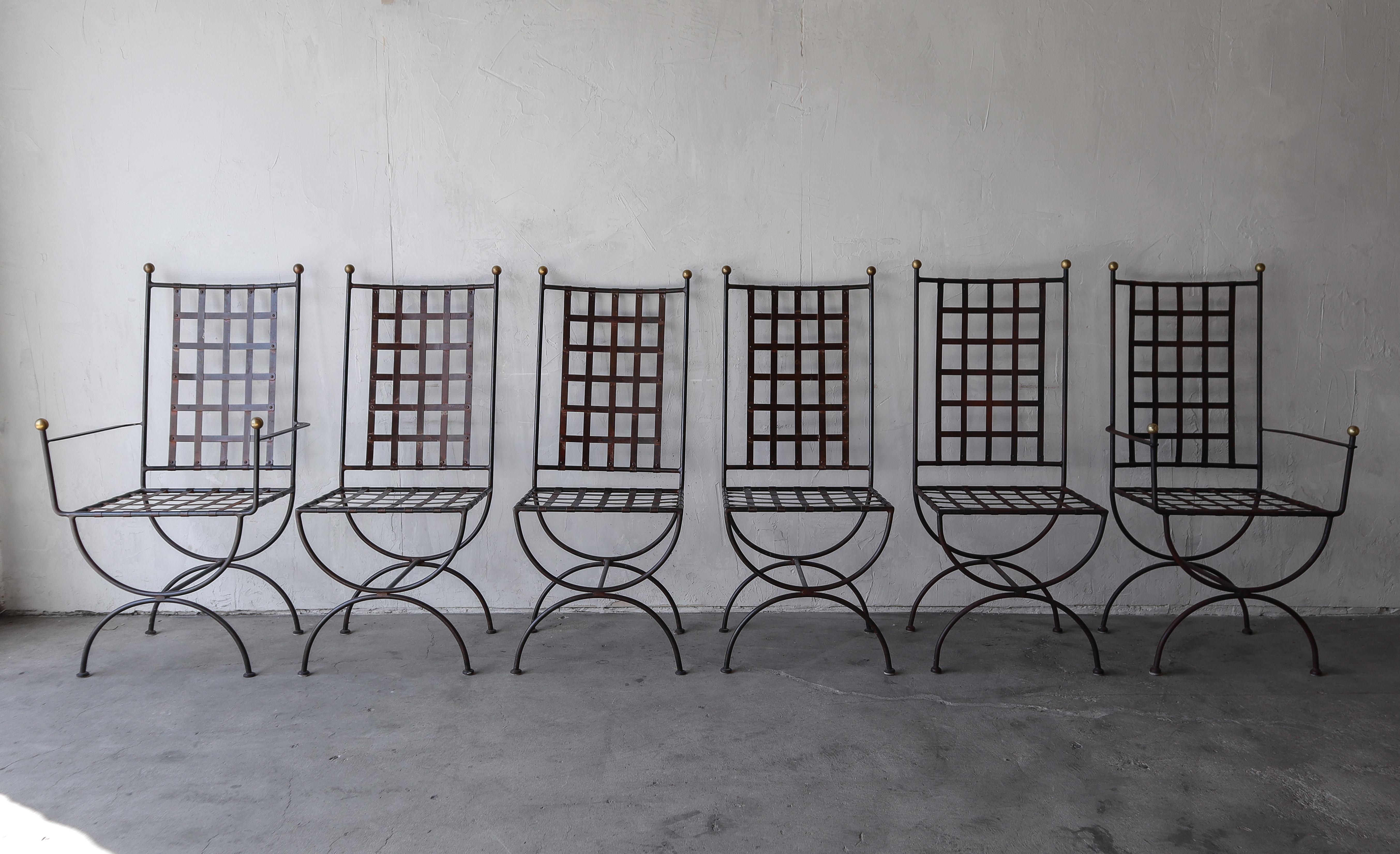 Love love love this set of 6 Vintage Iron garden chairs.  The chairs feature nice woven metal details and brass ball caps.  They are attributed to Mario Papperzini for Salterini.  The set is comprised of 4 side chairs and 2 arm chairs.

Each chair