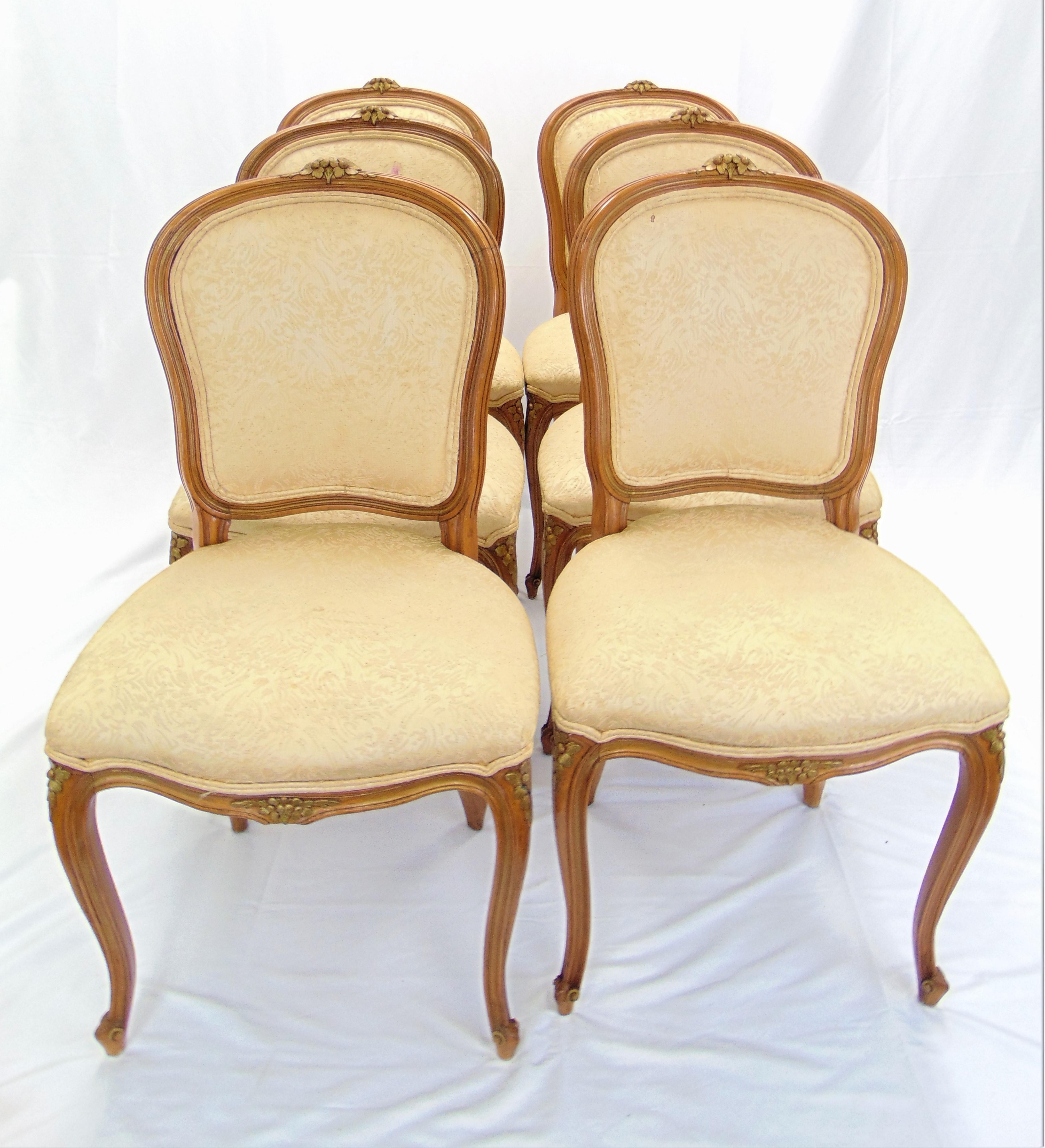 These are a set of 6 vintage Italian dining chairs from the 1960s. They have wonderful hand carved and hand painted detail. All are in very nice structural condition. The chairs show normal signs of age and use. They do need to be reupholstered.