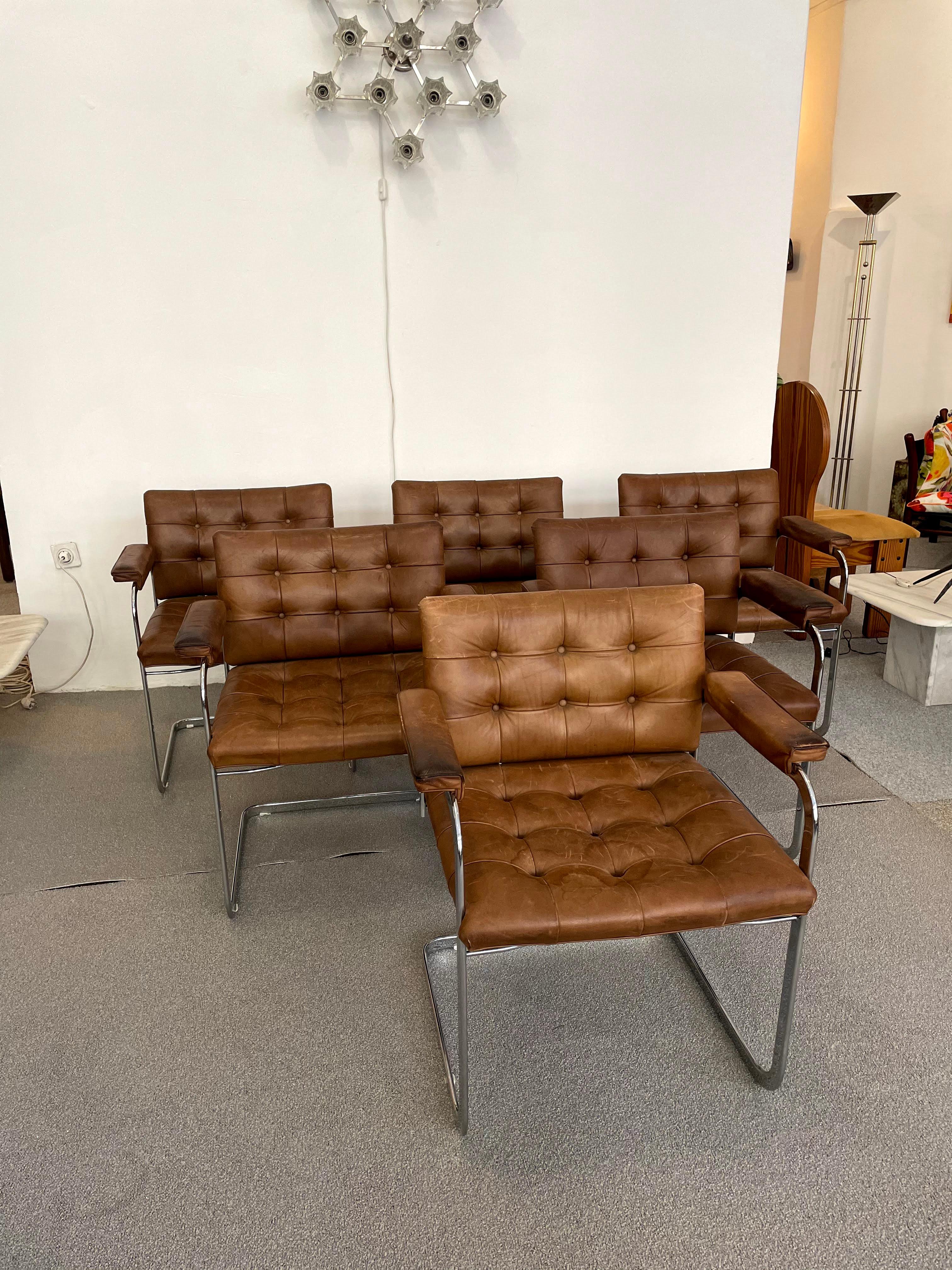 A rare set of six RH-305 armchairs designed by Robert Haussman and manufactured by De Sede. Made in Switzerland, they date from circa 1960s.