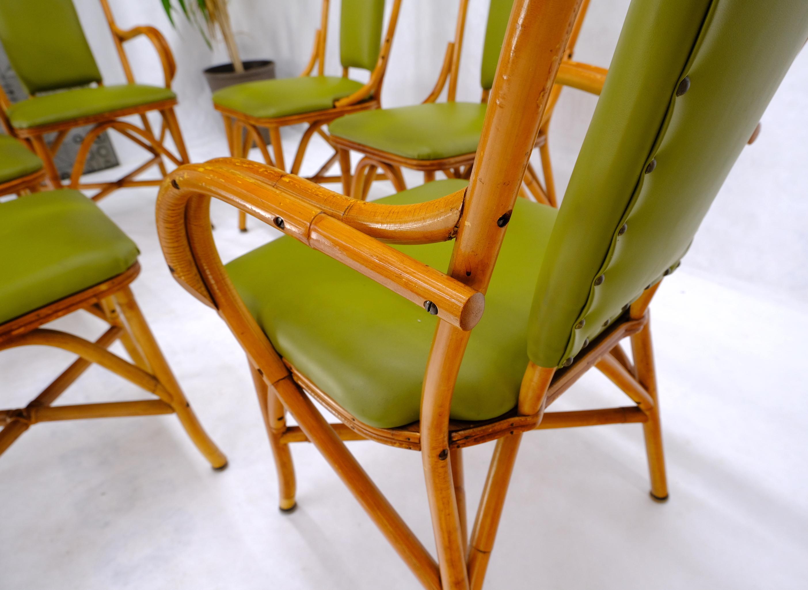 Set of vintage c.1960s rattan bamboo dining room chairs. Two armchairs.