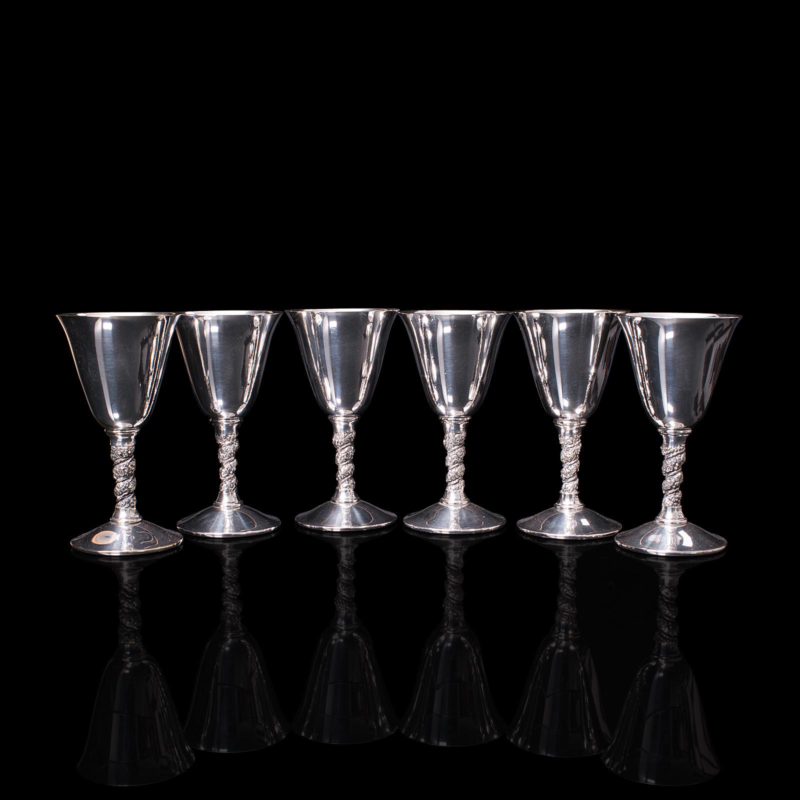 Our Stock # 18.7882

This is a set of 6 vintage sherry goblets. A Spanish, silver plate celebration liqueur tot, dating to the late 20th century, circa 1970.

Dashing and comprehensive set of tactile sherry goblets
Displays a desirable aged