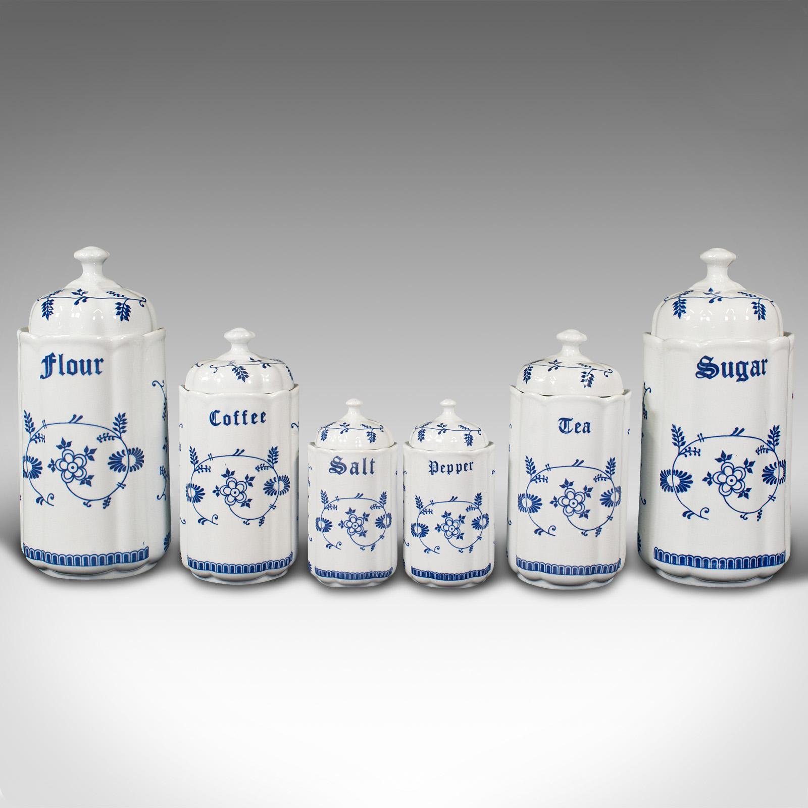 This is a set of 6 vintage storage jars. A German, ceramic kitchen canister with Blue Onion pattern, dating to the mid 20th century, circa 1950.

Charming set of wonderfully useful jars
Displays a desirable aged patina throughout
Bright white