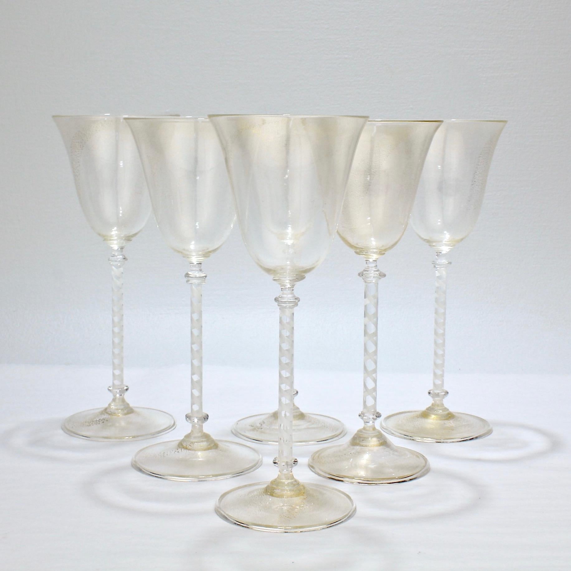 A good set of 6 vintage Murano or Venetian wine goblets.

The bowls and feet with gold inclusions and the stems with a twisted white filigrana cane. 

Simple and refined wine stems that are perfect for the modern table!

Measures: Height ca. 8 1/2