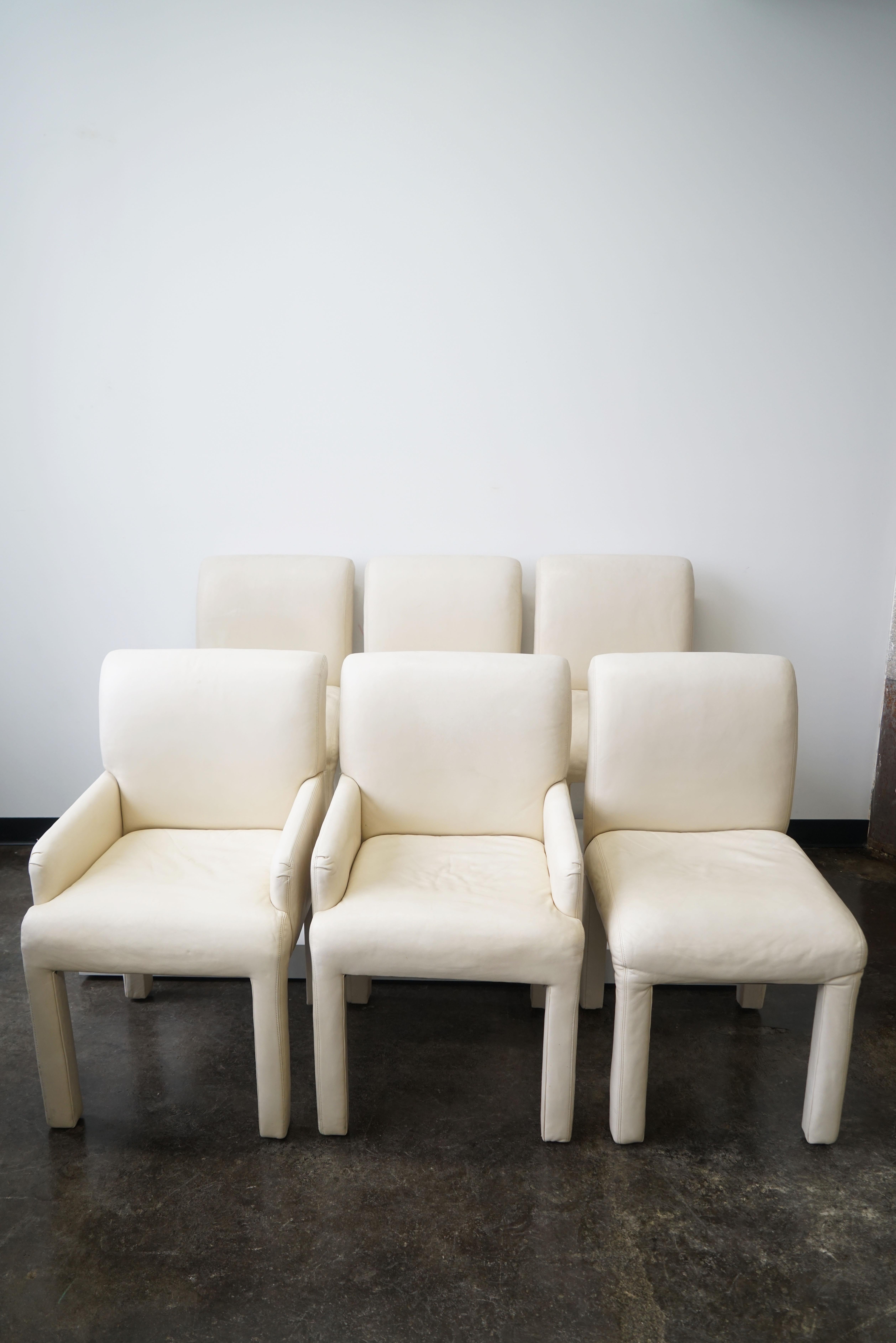 Set of 6 Modern Parson Dining Chairs made by Directional.

Off-white in color
Fully upholstered
4 arm-less chairs and 2 with arms.

Armchairs: 22