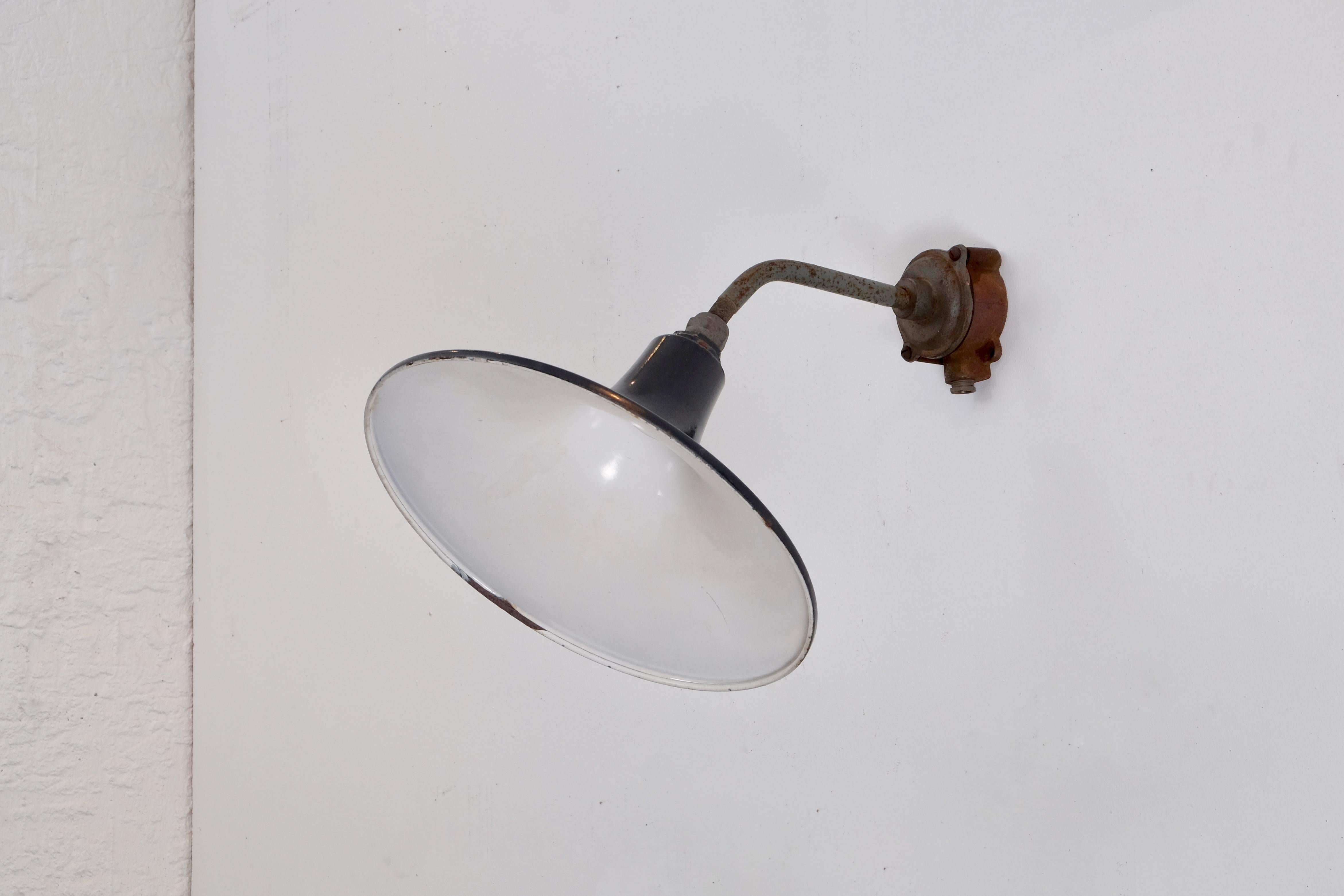 Listed priced is for one (1) light, 6 available
- Produced in Sweden, early 1930s
- Enamelled shade with the right industrial look
- Black original color with signs of usage/patina/rusty
- New wiring, height is adjustable
- Height of the