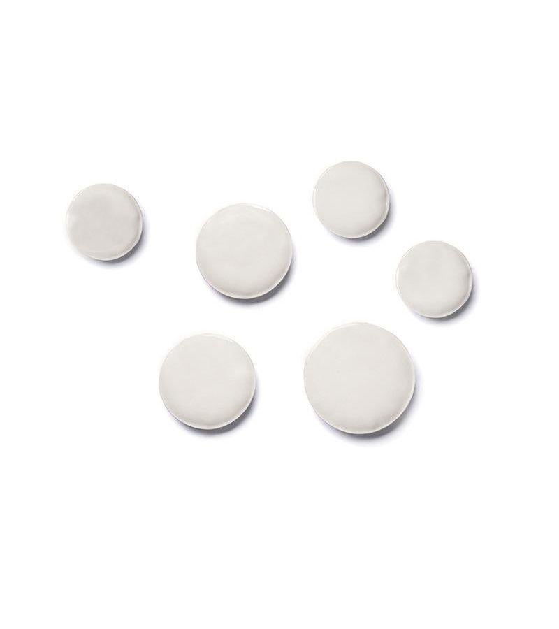 Set of 6 white matt pin wall decor by Zieta
Dimensions: diameter 10, 12, 14 cm 
Material: Carbon steel.
Finish: Powder-coated. Matt finish. 
Available powder-coated in colors: beige grey, graphite, grey blue, stainless steel, moss green, umbra grey,