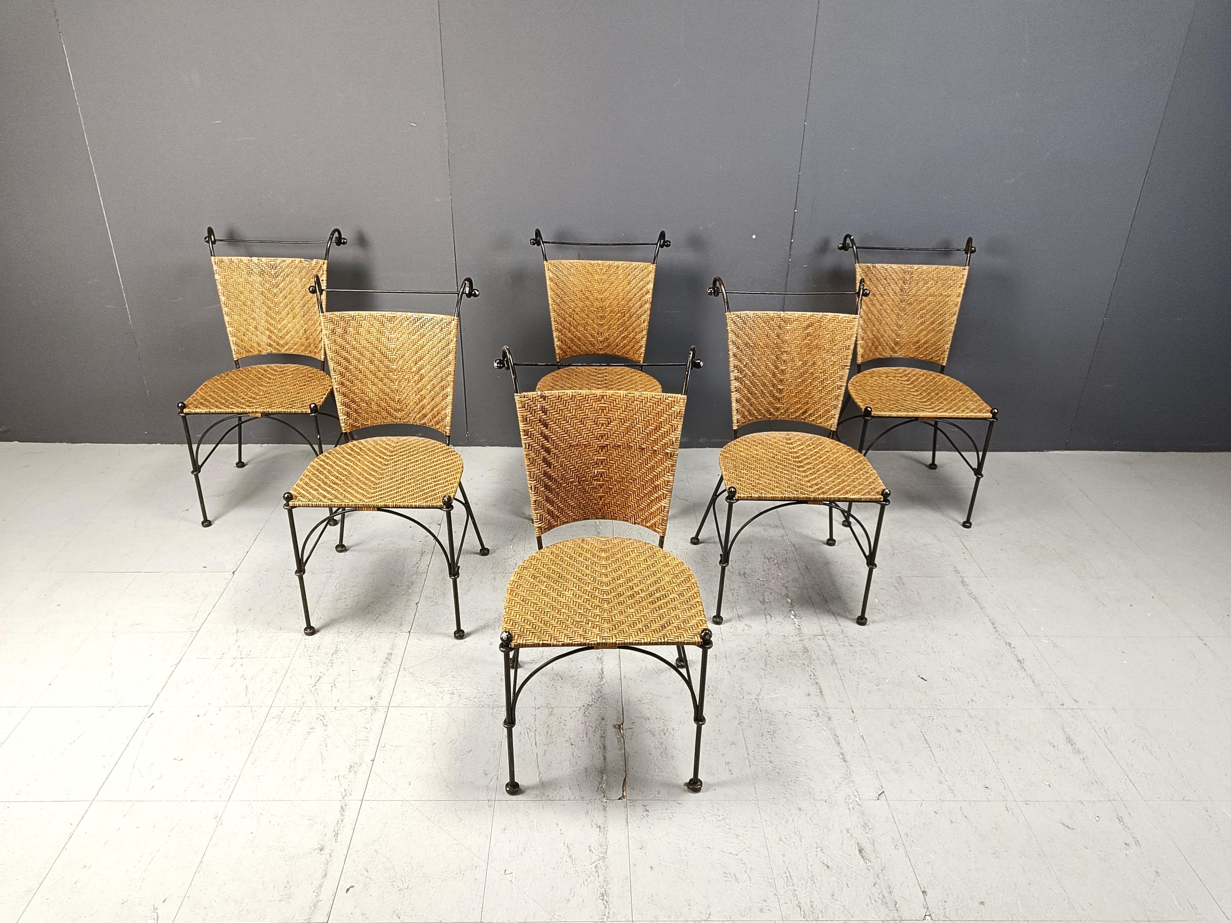 Elegant mid century wrought iron and wicker bistro chairs.

These beautiful chairs feature a well crafted wrought iron frame and beautifully woven wicker seats.

Beautiful terras or bistro chairs.

1960s - France

Very good