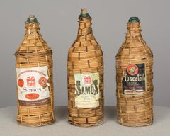 Set of 6 Wicker Wrapped Glass Bottles