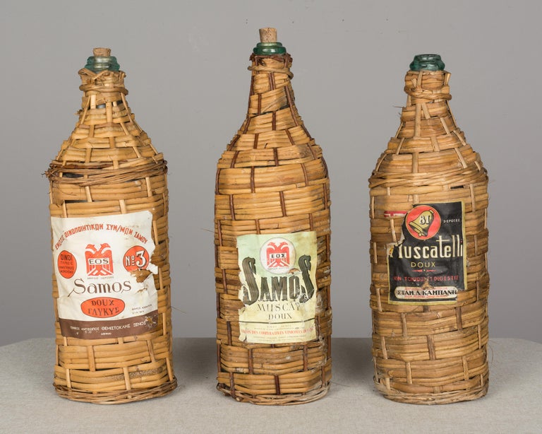 Set of 6 Wicker Wrapped Glass Bottles at 1stDibs