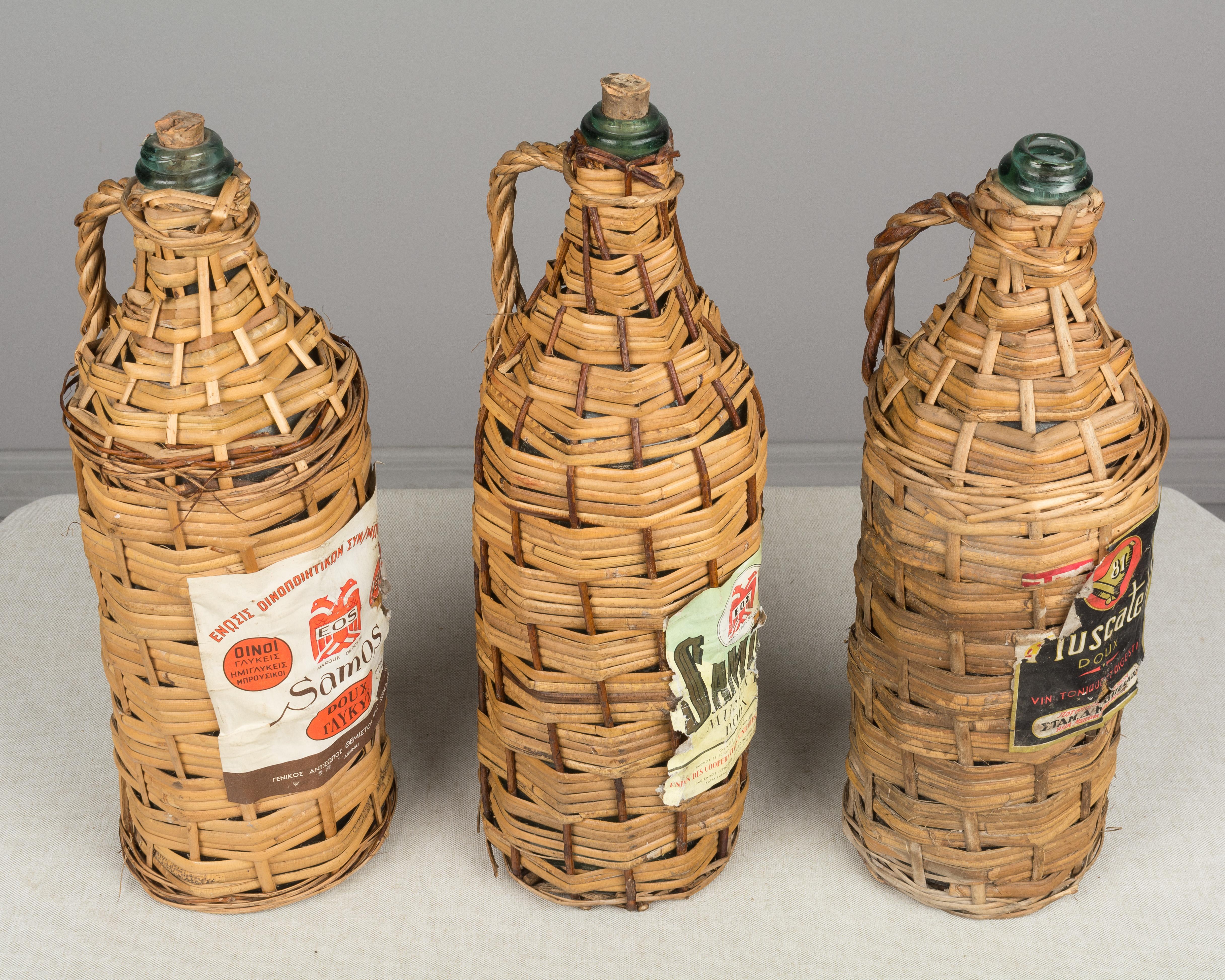 20th Century Set of 6 Wicker Wrapped Glass Bottles