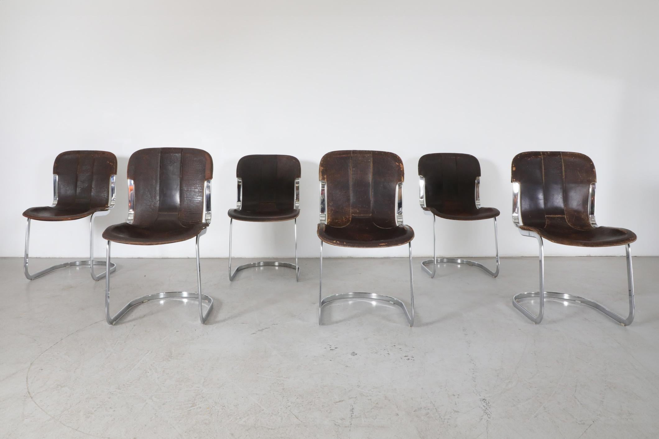 Mid-Century, late nineteen sixties, chrome and leather, cantilevered chairs by Italian designer and photographer Willy Rizzo for famed manufacturer Cidue. In original condition with visible wear and heavy patina, consistent with their age and use.
