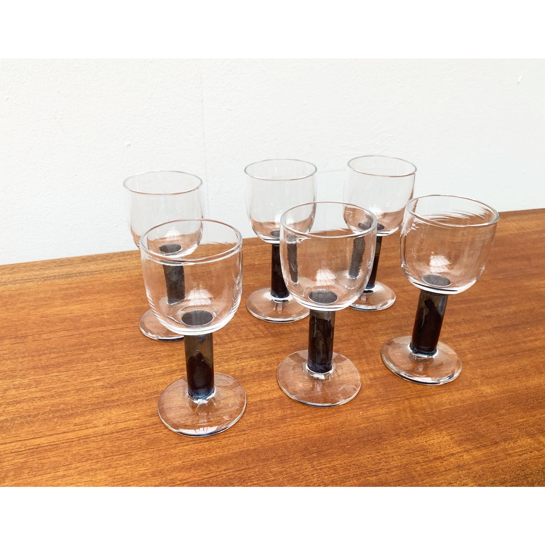Rare design wine glasses from the StudioLashütte Glashagen according to a design by Regina Kaufmann. The glasses are signed and dated. This piece has an attribution mark.

Additional information:
Materials: Glass
Color: Blue
Country of Origin: