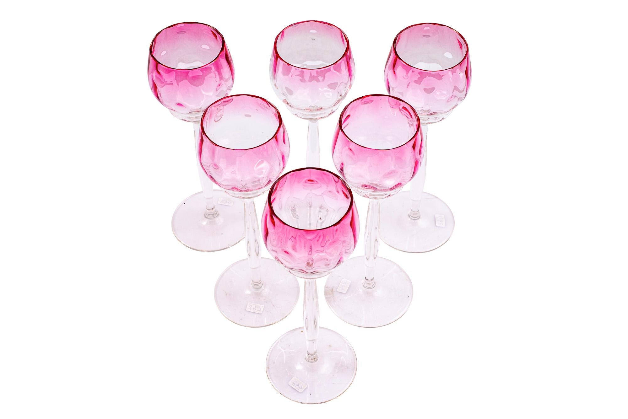 Set of 6 wine glasses Meteor decoration pink Koloman Moser Meyr's Neffe ca. 1901 Austrian Jugendstil

The “Meteor” decoration was used for entire sets as well as for individual glass objects. The glasses were produced by the Bohemian company