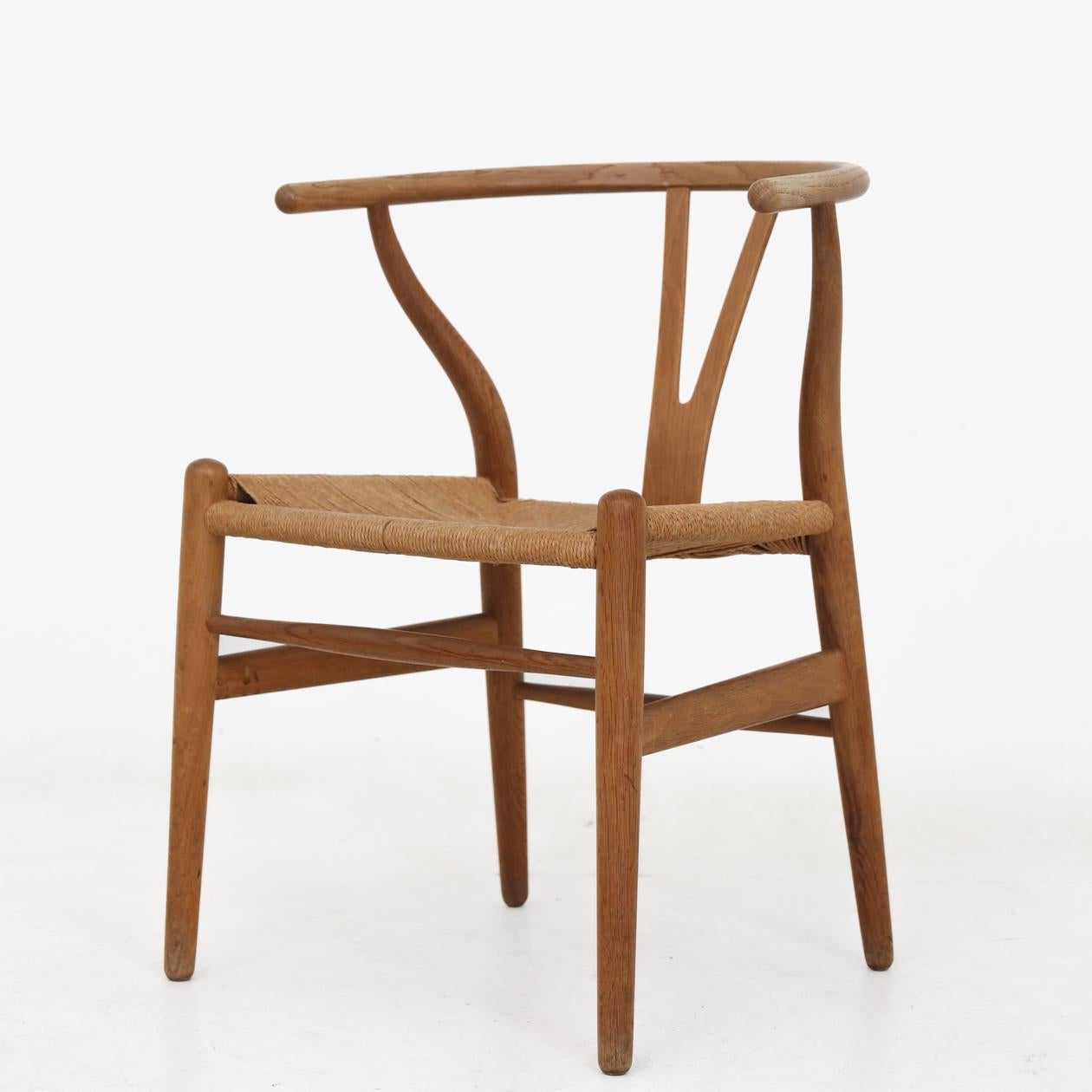 Set of six CH 24 - The Wishbone chairs patinated oak and braided paper cord. Hans J. Wegner / Carl Hansen