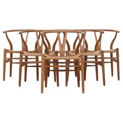 Set of 6 Wishbone Dining Chairs by Hans J. Wegner. 