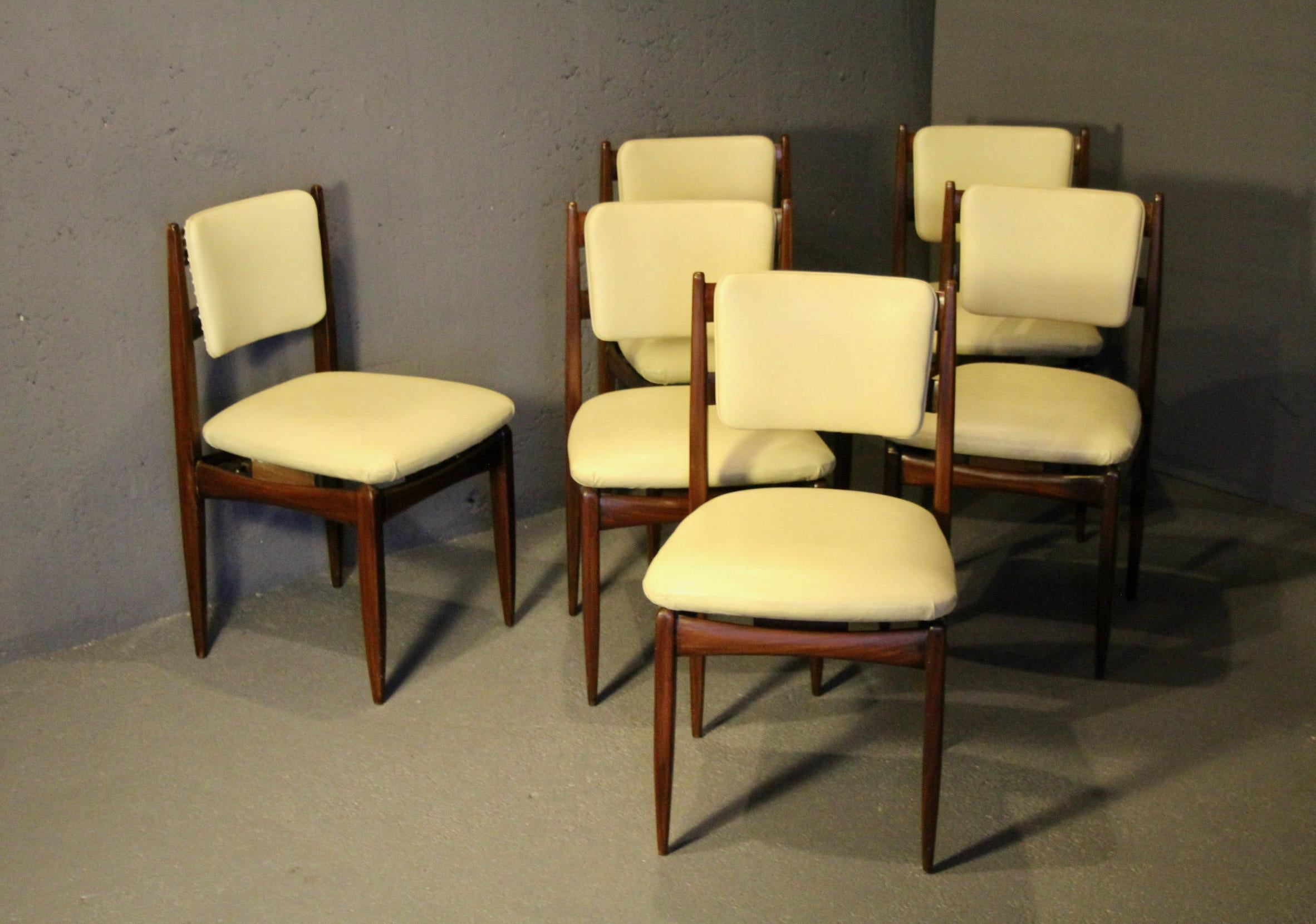set of 6 chairs of Italian production in wood and faux leather the placet was probably raised later