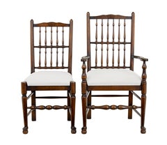 Set of 6+2 oak spindle back dining chairs